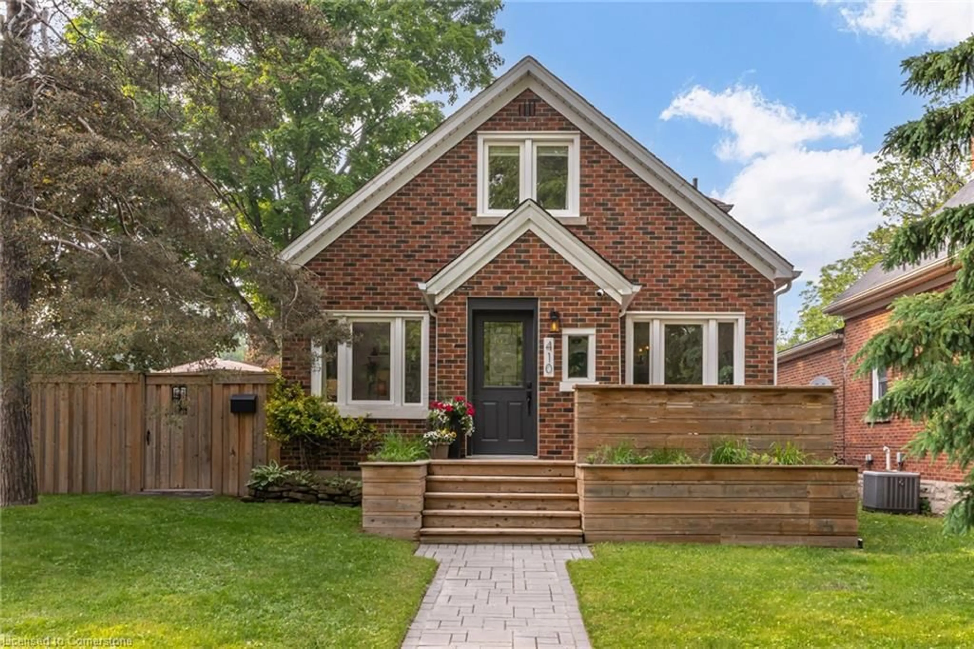 Home with brick exterior material, street for 410 Louisa St, Kitchener Ontario N2H 5N5