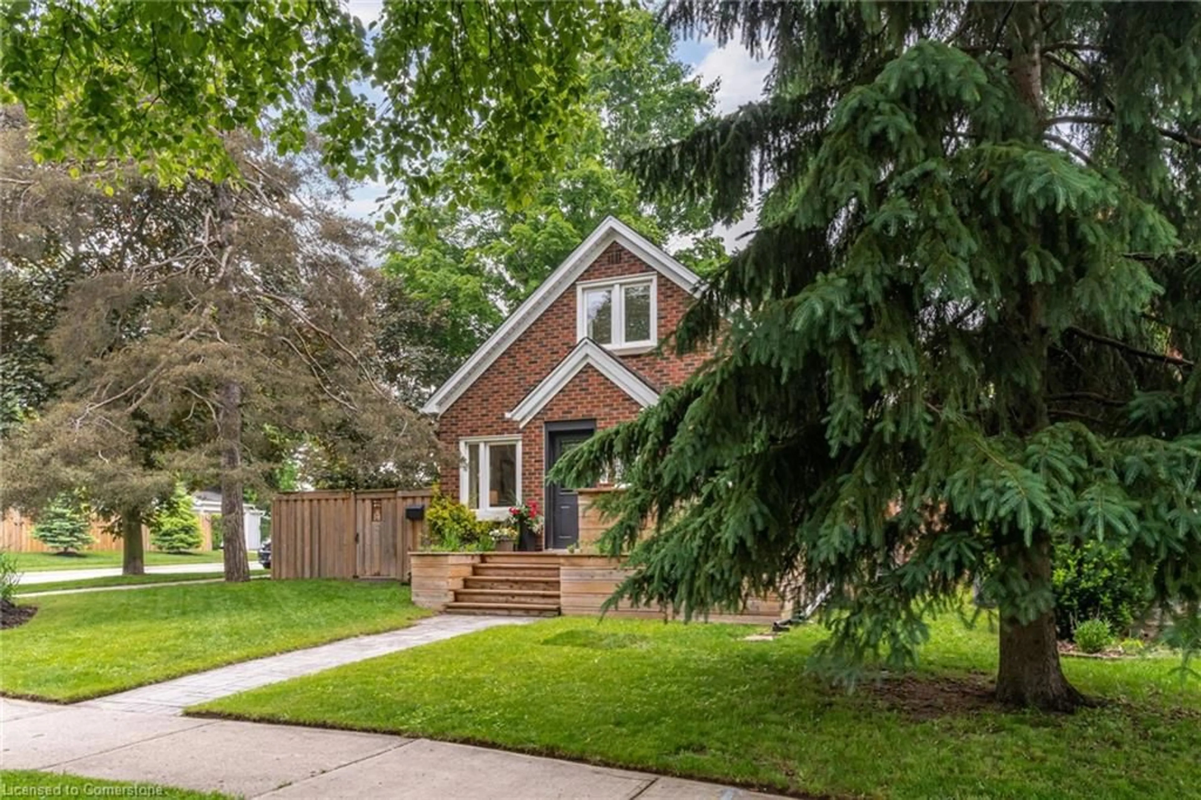 Home with brick exterior material, street for 410 Louisa St, Kitchener Ontario N2H 5N5
