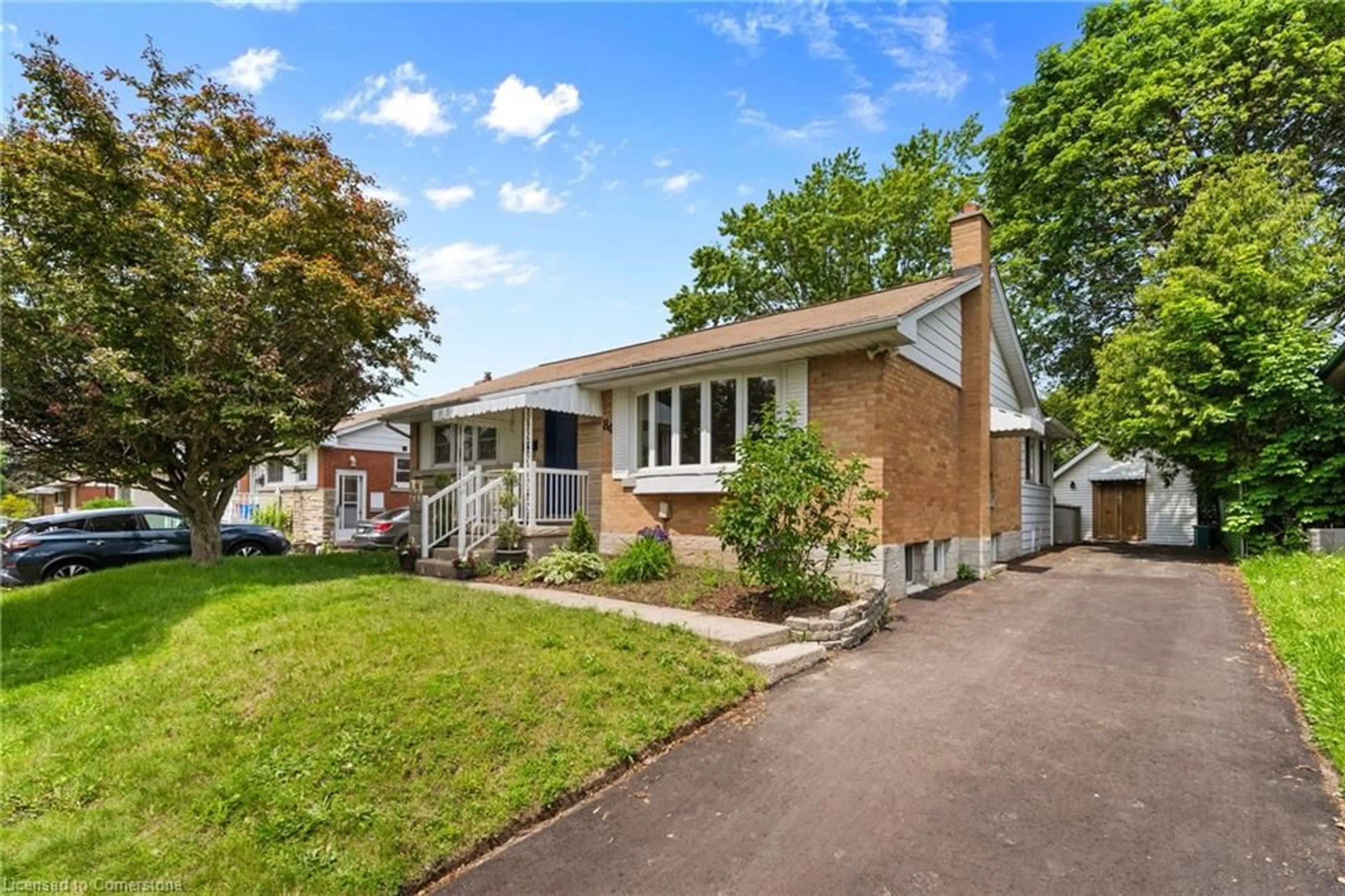 Home with brick exterior material, street for 84 Elgin Cres, Waterloo Ontario N2J 2S2
