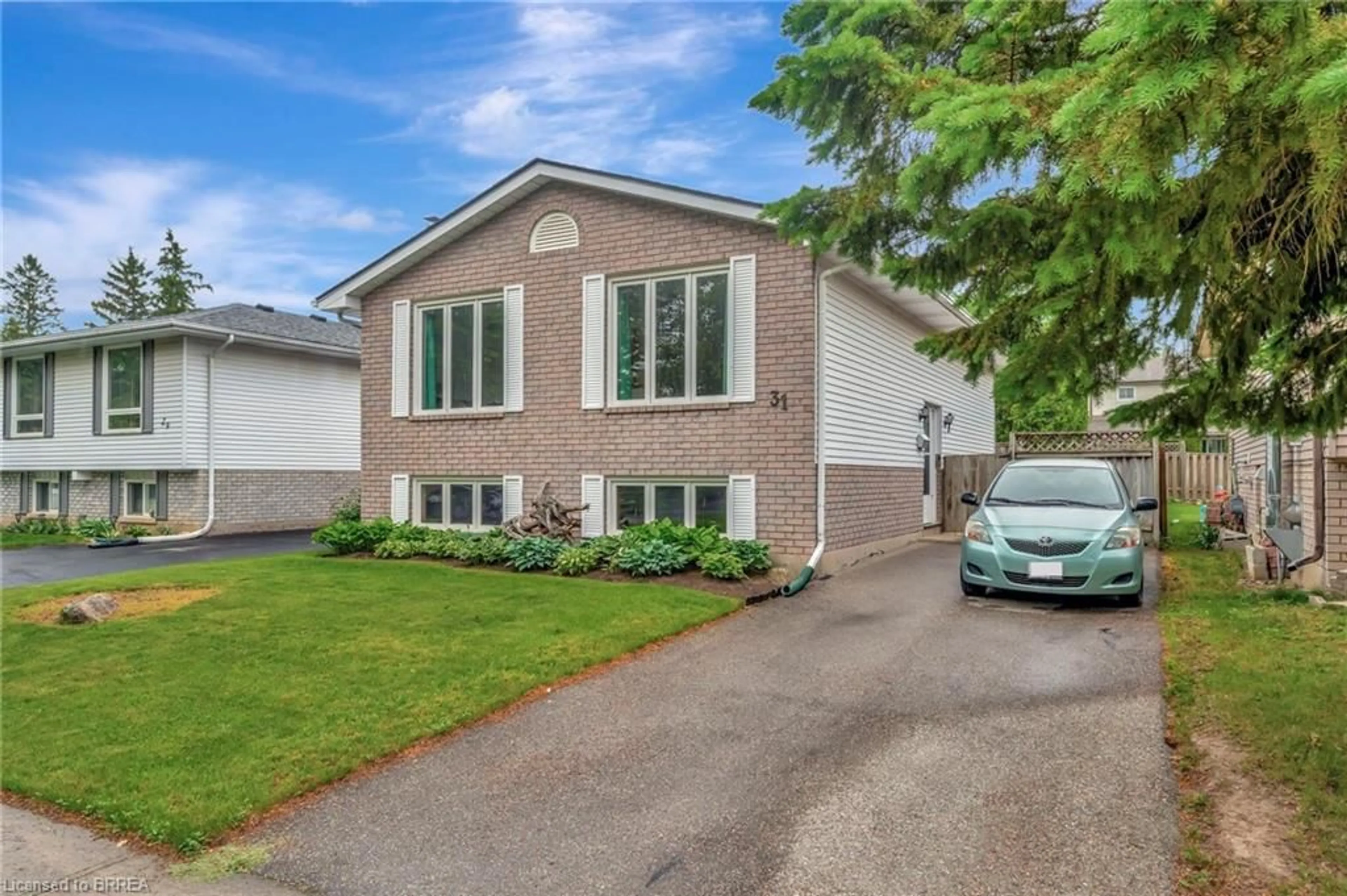 Home with brick exterior material, street for 31 Osijek Cres, Brantford Ontario N3P 1Z4