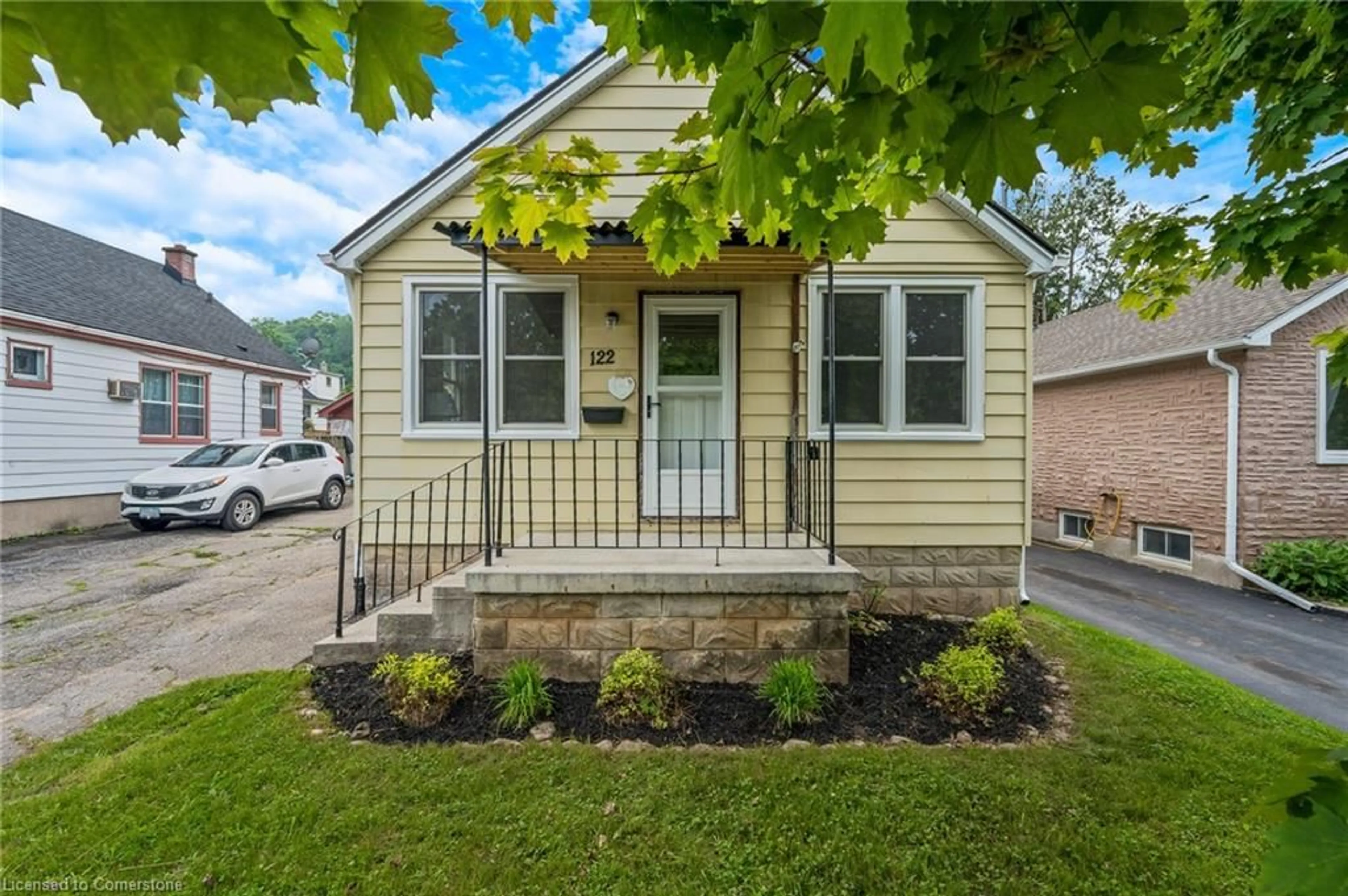 Home with vinyl exterior material, street for 122 Tait St, Cambridge Ontario N1S 3E5