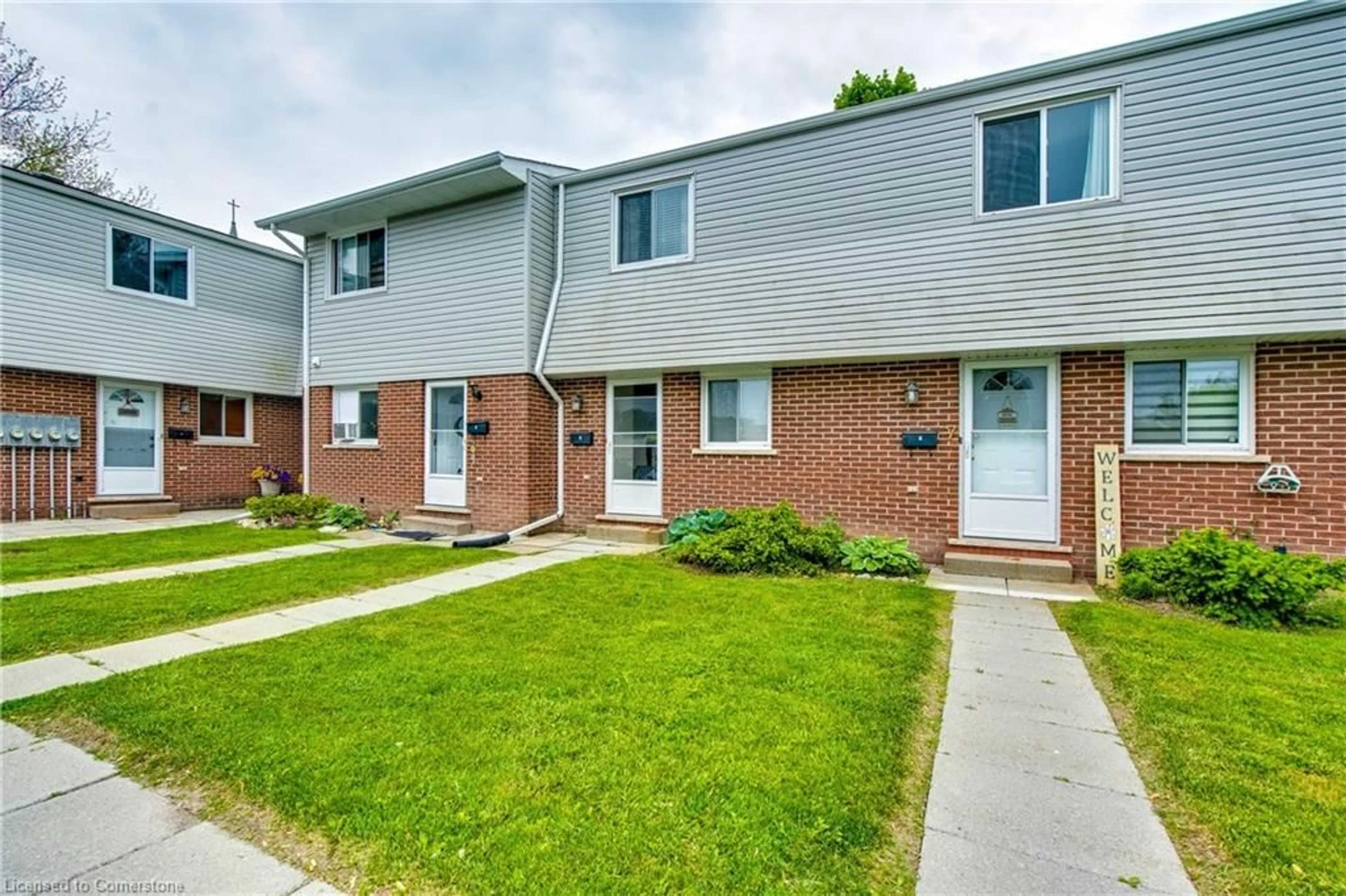 Home with brick exterior material, street for 63 Empire St #6, Welland Ontario L3B 2L3