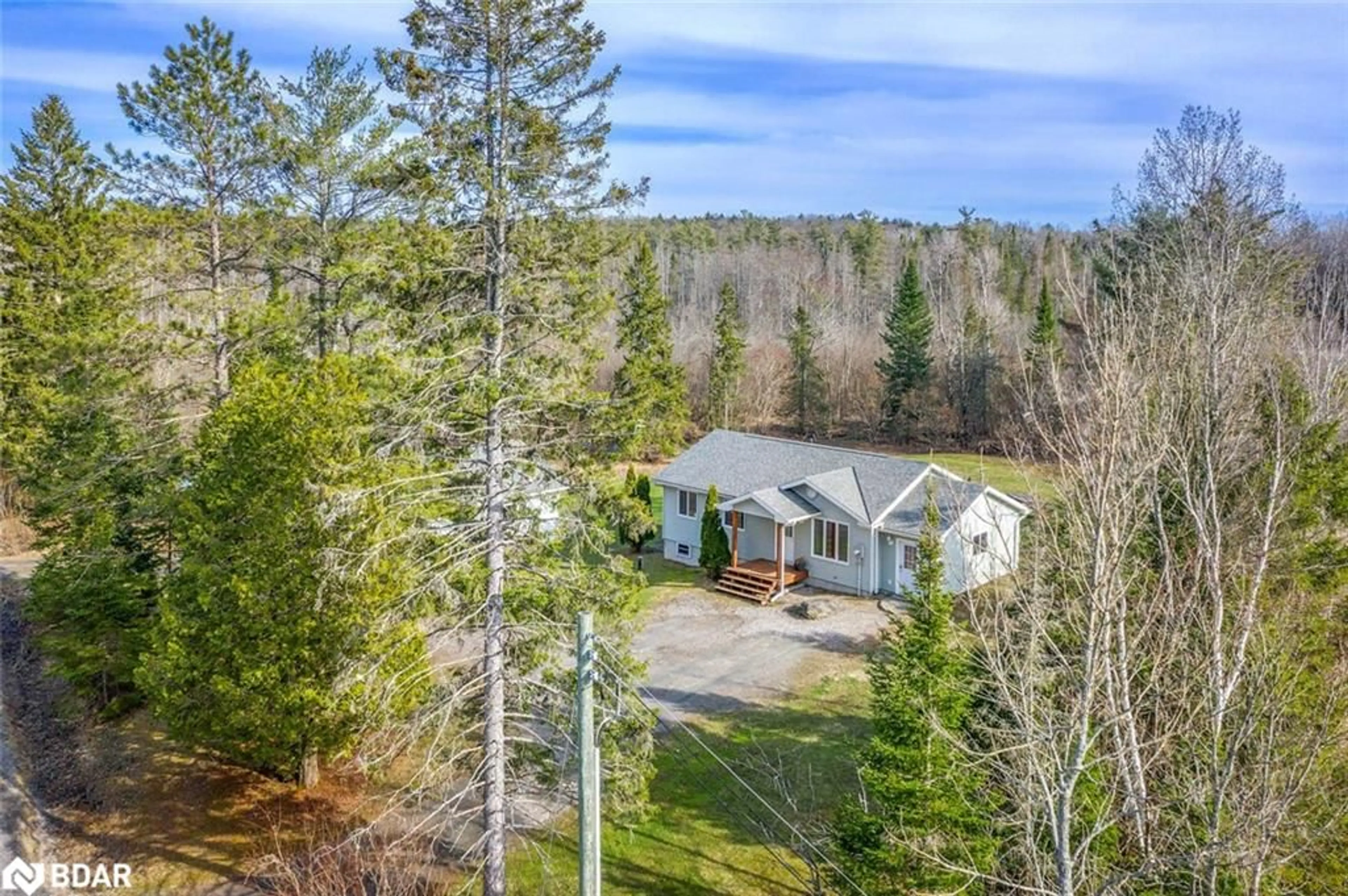 A pic from outside/outdoor area/front of a property/back of a property/a pic from drone, forest/trees view for 115 Mccans Rd, Seguin Ontario P0C 1J0
