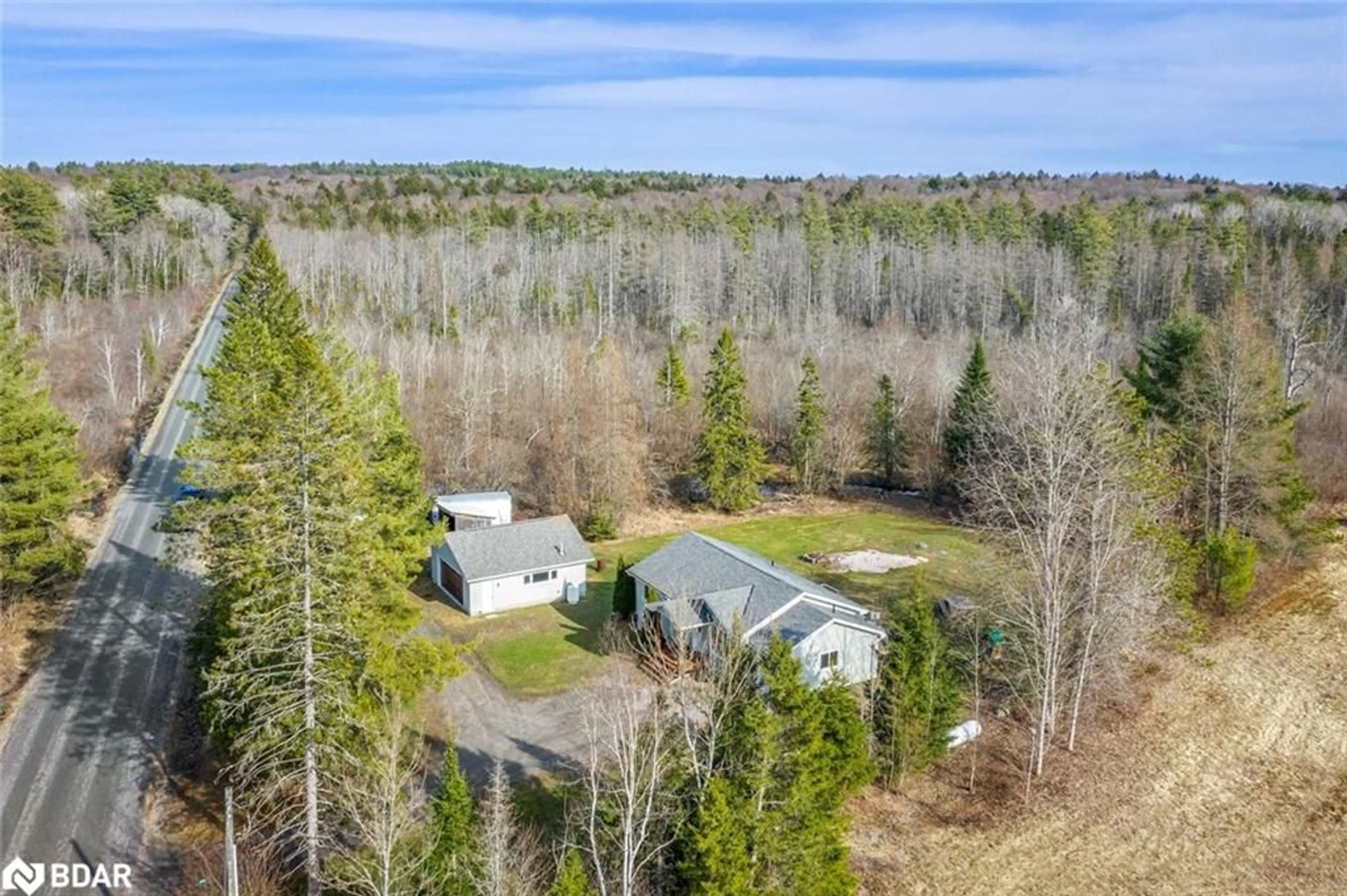 A pic from outside/outdoor area/front of a property/back of a property/a pic from drone, forest/trees view for 115 Mccans Rd, Seguin Ontario P0C 1J0