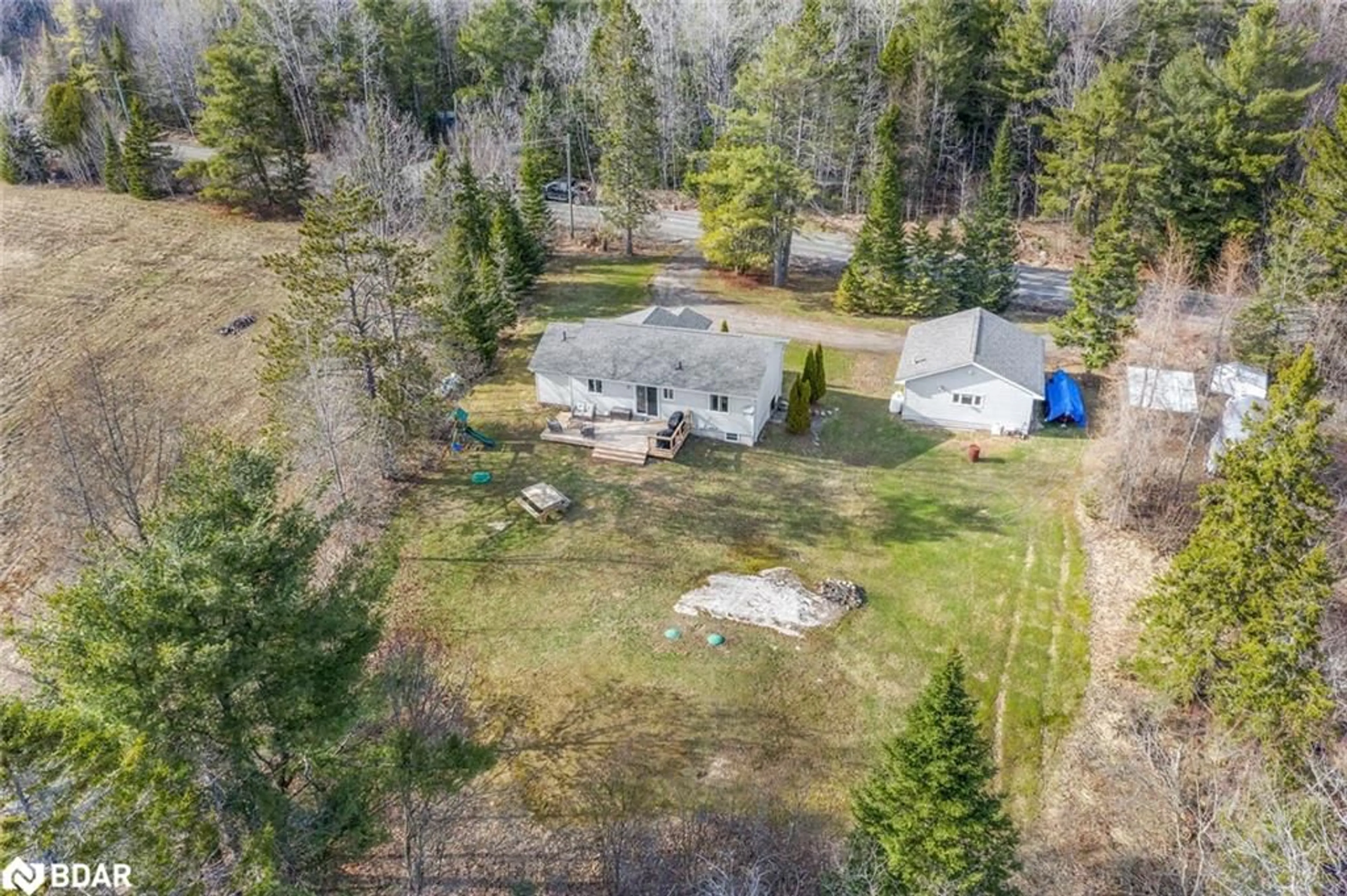 A pic from outside/outdoor area/front of a property/back of a property/a pic from drone, forest/trees view for 115 Mccans Rd, Seguin Ontario P0C 1J0
