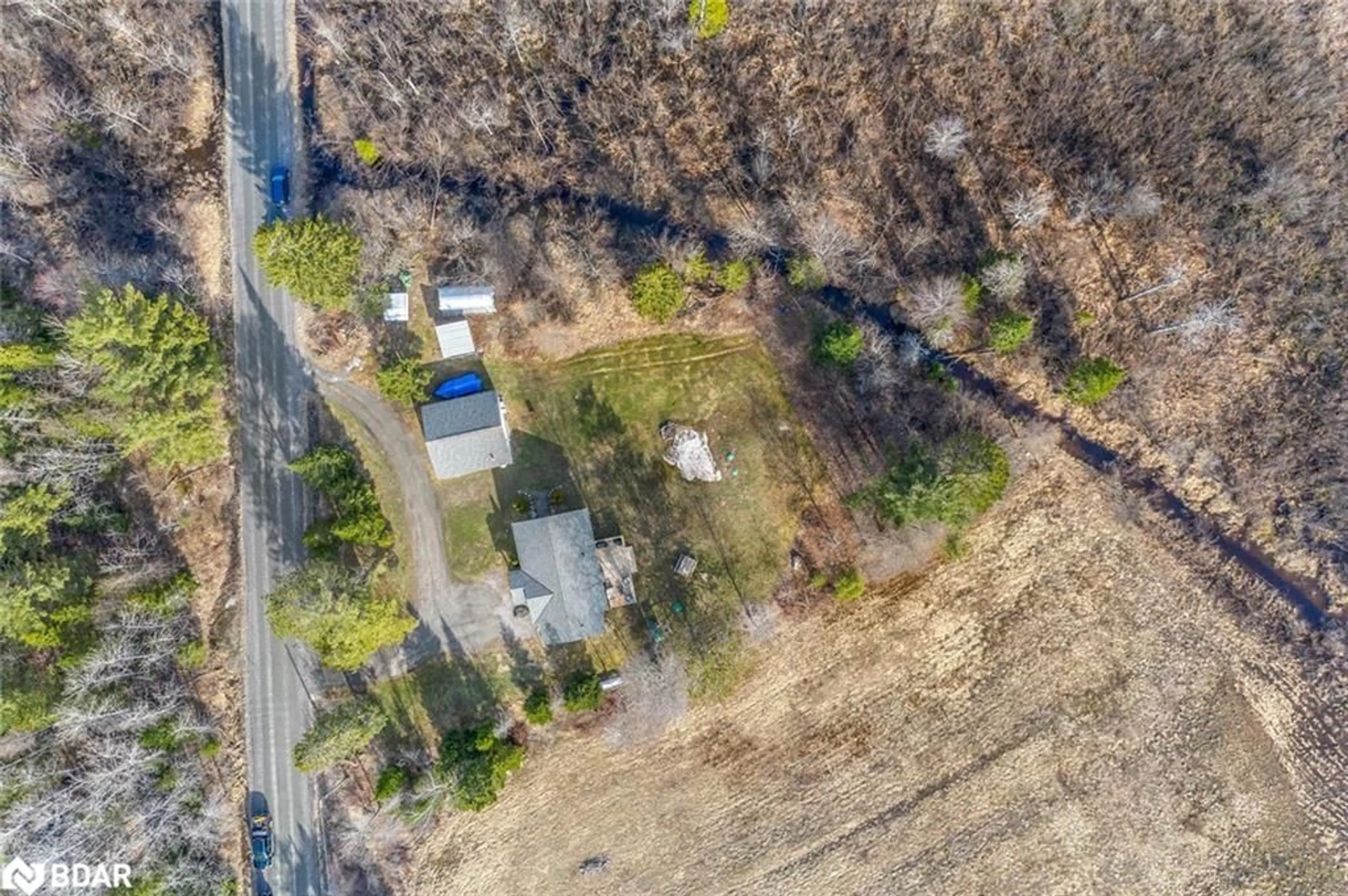 A pic from outside/outdoor area/front of a property/back of a property/a pic from drone, street for 115 Mccans Rd, Seguin Ontario P0C 1J0