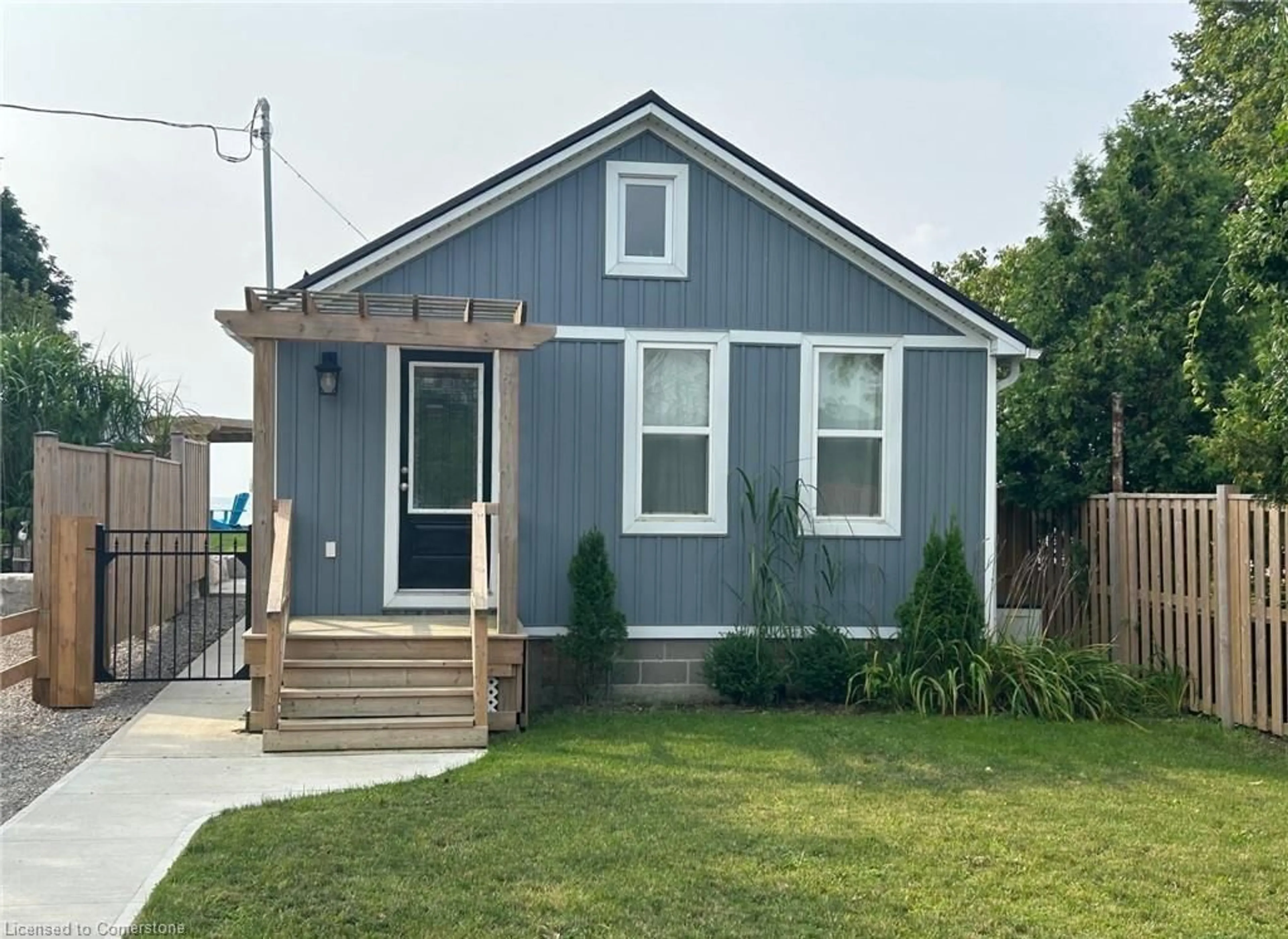 Home with vinyl exterior material, street for 2130 Lakeshore Rd, Dunnville Ontario N1A 2W8