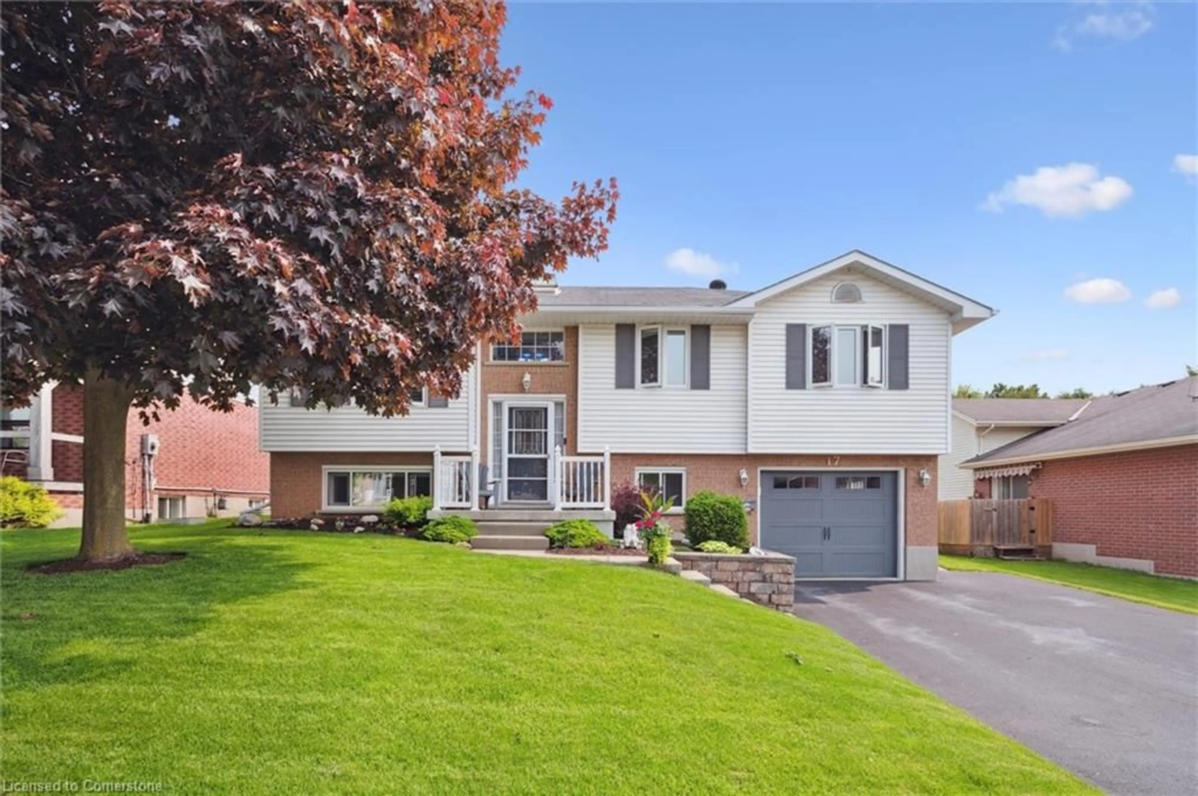 Home with vinyl exterior material, street for 17 Keating Dr, Elora Ontario N0B 1S0