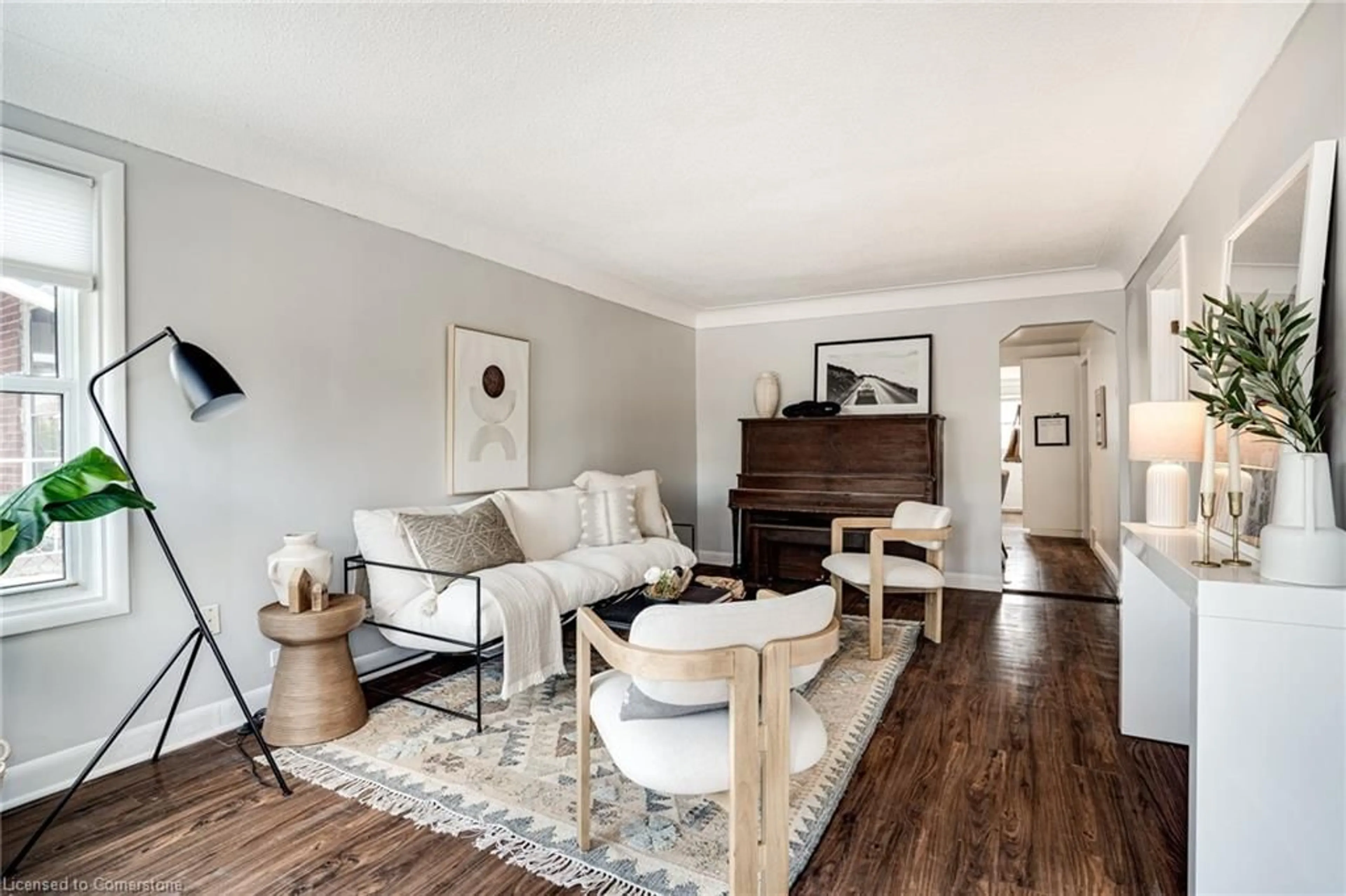 Living room with furniture, wood/laminate floor for 77 East 24th St, Hamilton Ontario L8V 2X9
