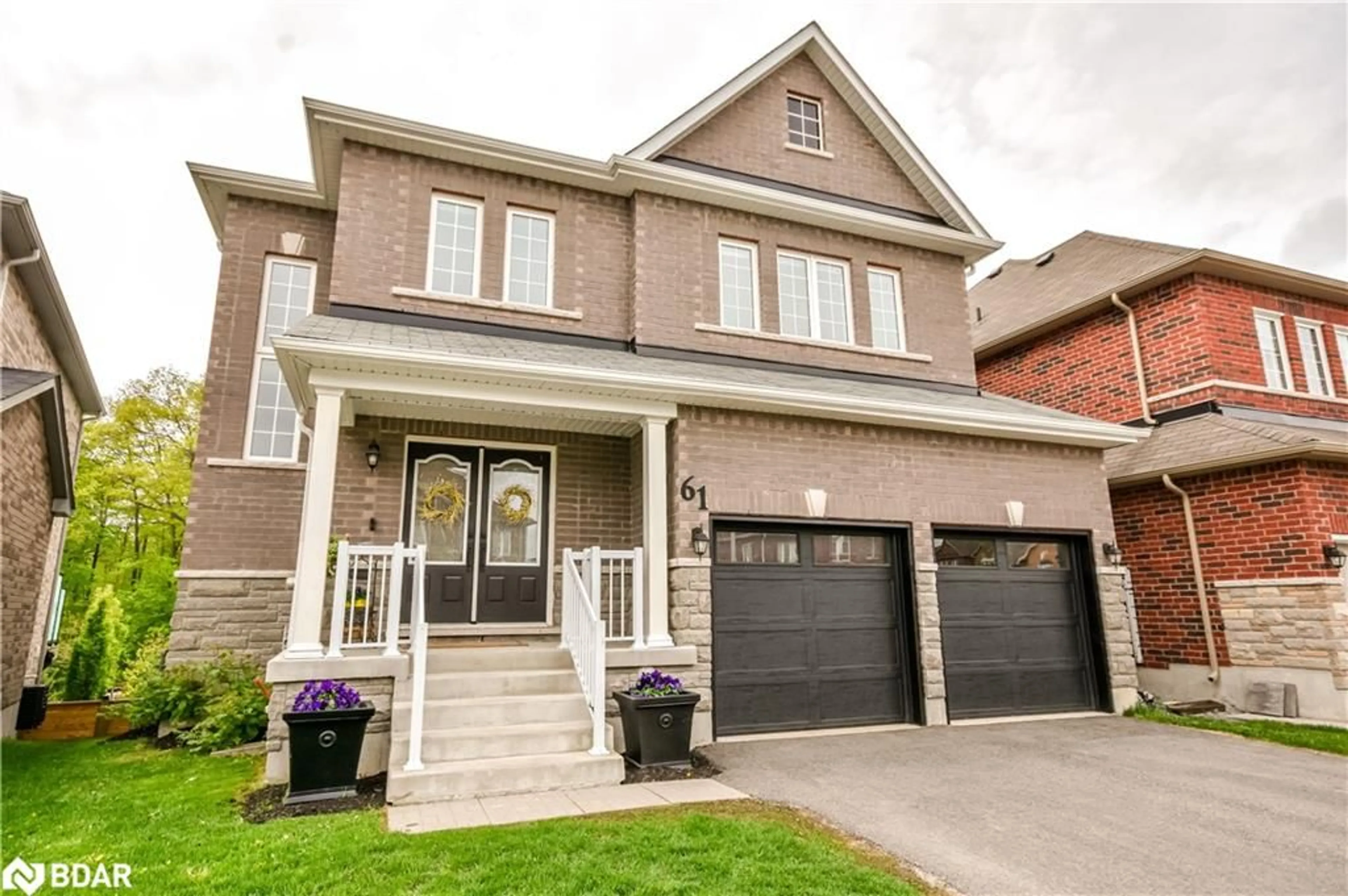 Home with brick exterior material, street for 61 Muirfield Drive Dr, Barrie Ontario L4N 6J9