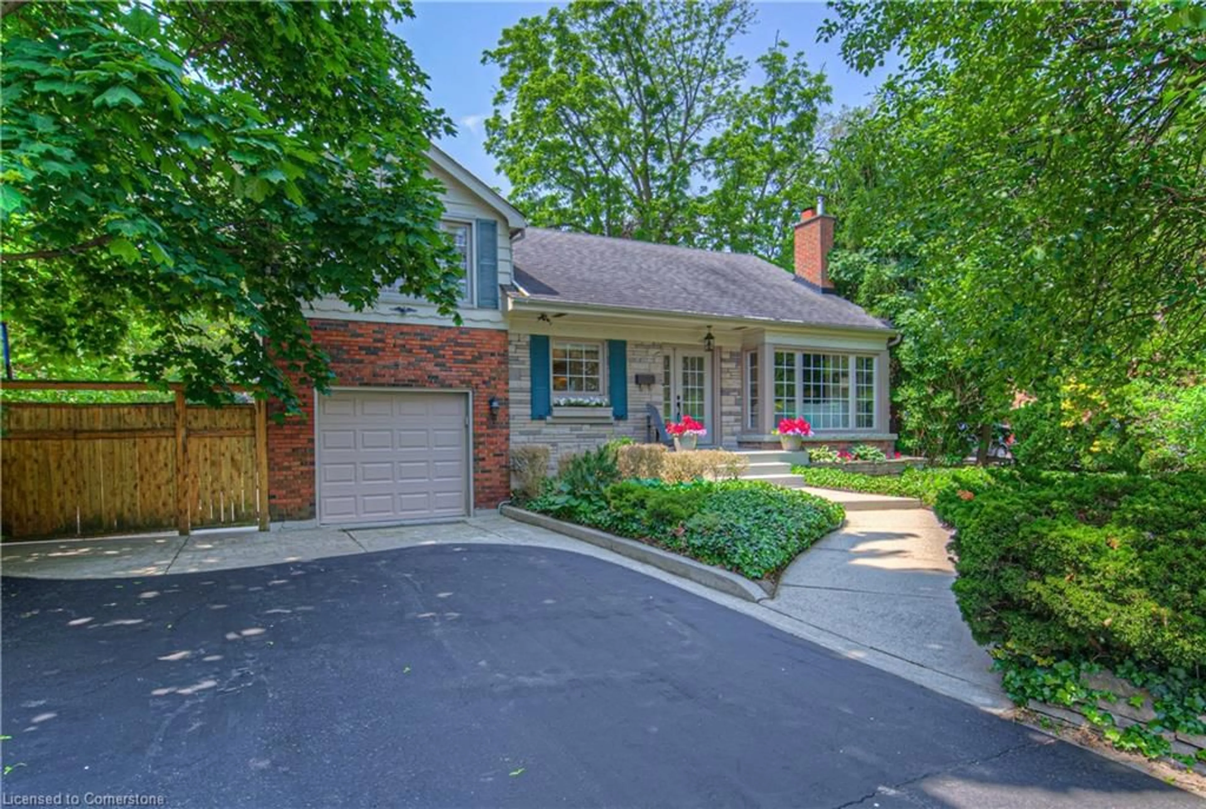 Home with brick exterior material, street for 976 Filmandale Rd, Burlington Ontario L7T 2Z4