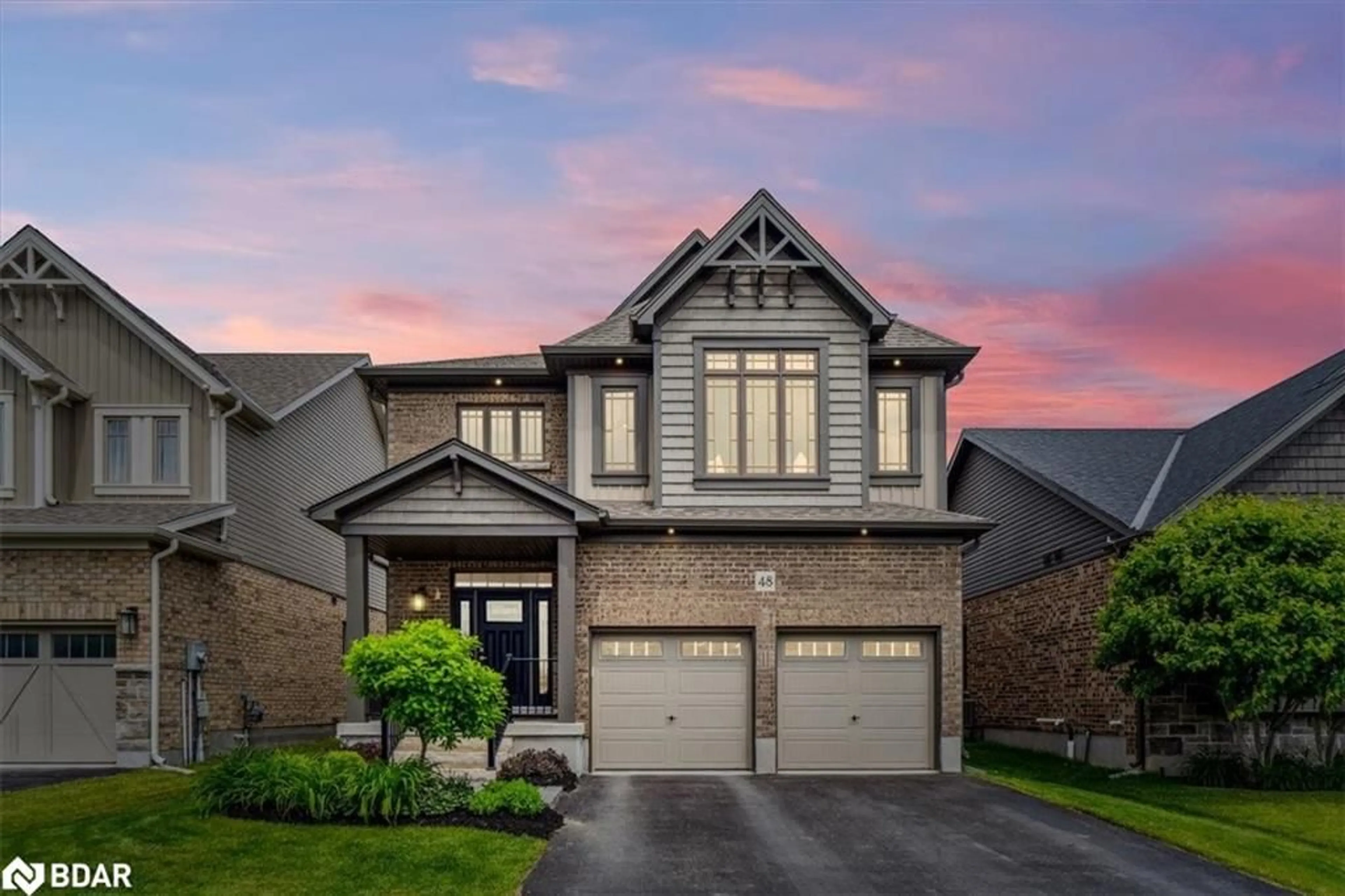 Home with brick exterior material, street for 48 Plewes Dr, Collingwood Ontario L9Y 3B7