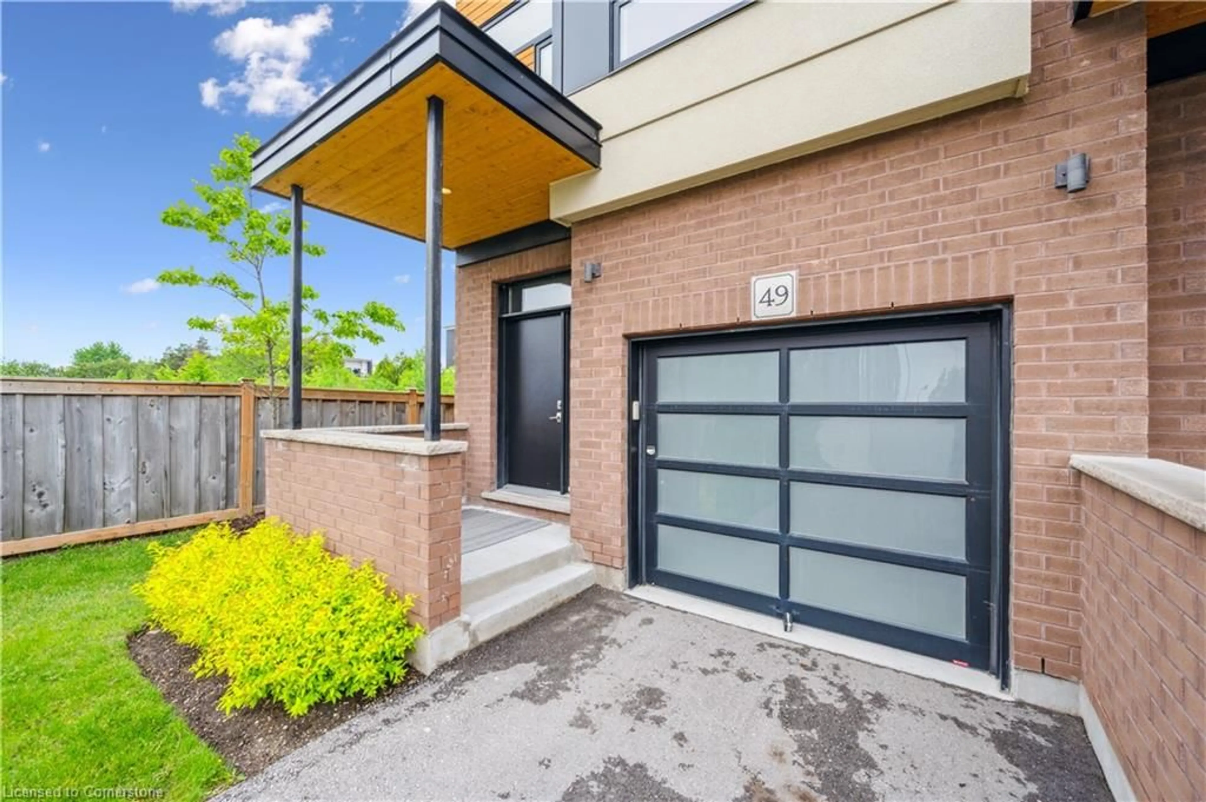 Home with brick exterior material, street for 60 Arkell Rd #49, Guelph Ontario N1L 0N8