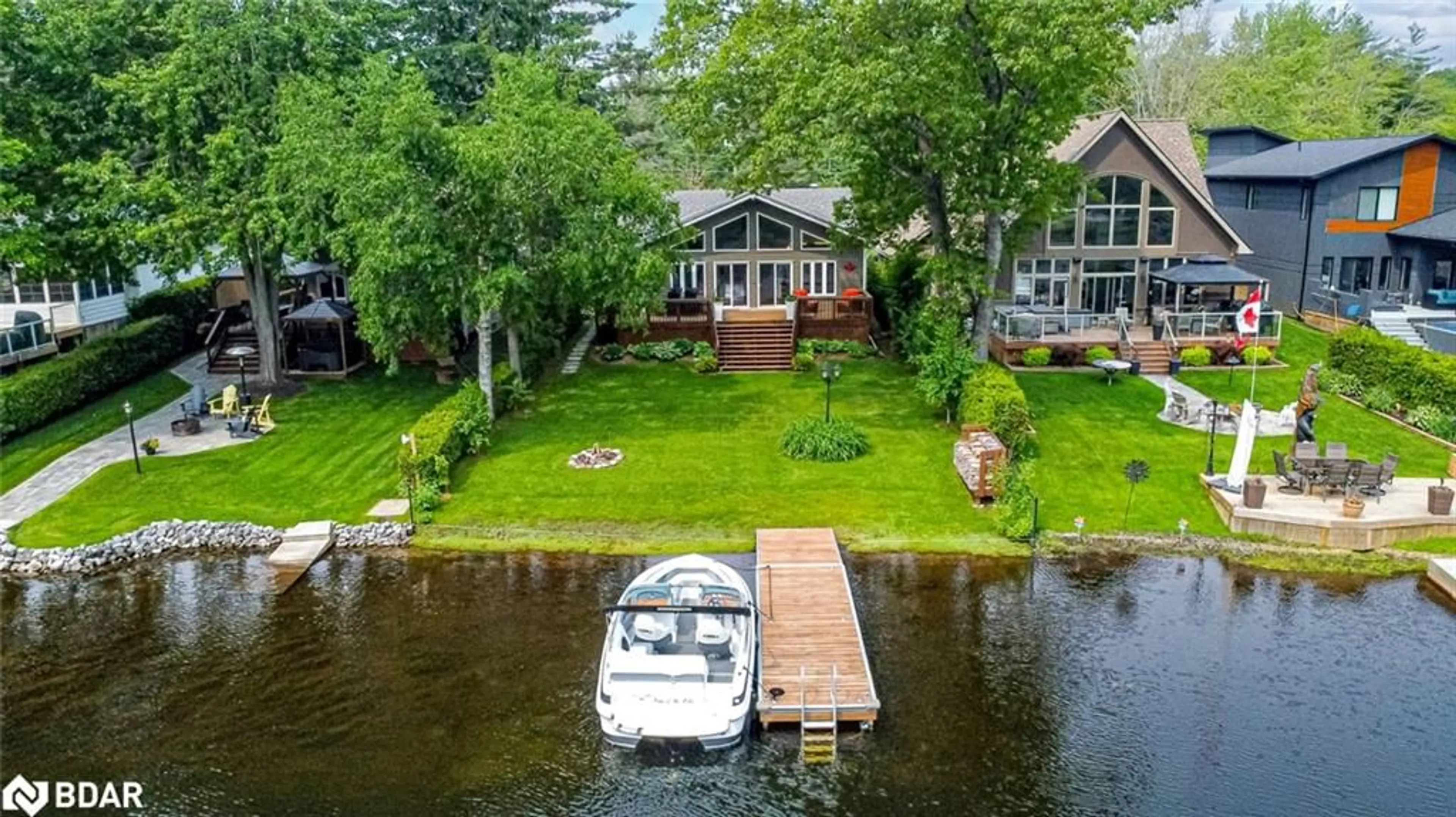 A pic from outside/outdoor area/front of a property/back of a property/a pic from drone, water/lake/river/ocean view for 1663 Peninsula Point Rd, Severn Ontario P0E 1N0