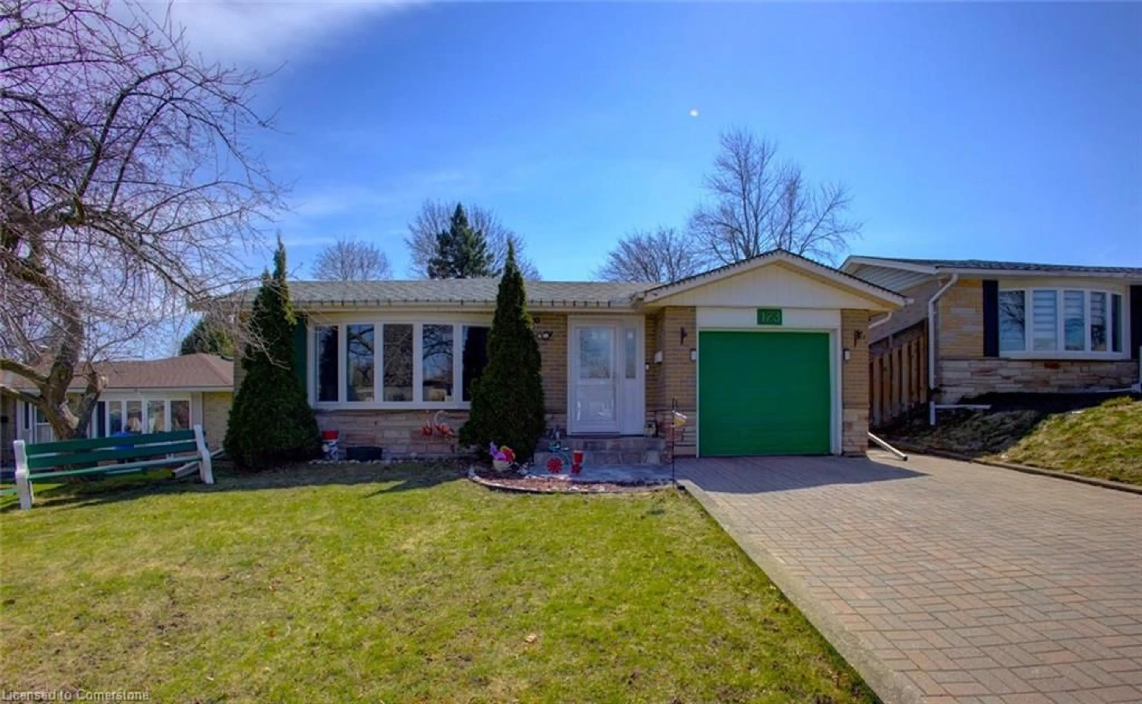 Home with brick exterior material, street for 173 Hazelglen Dr, Kitchener Ontario N2M 2E6