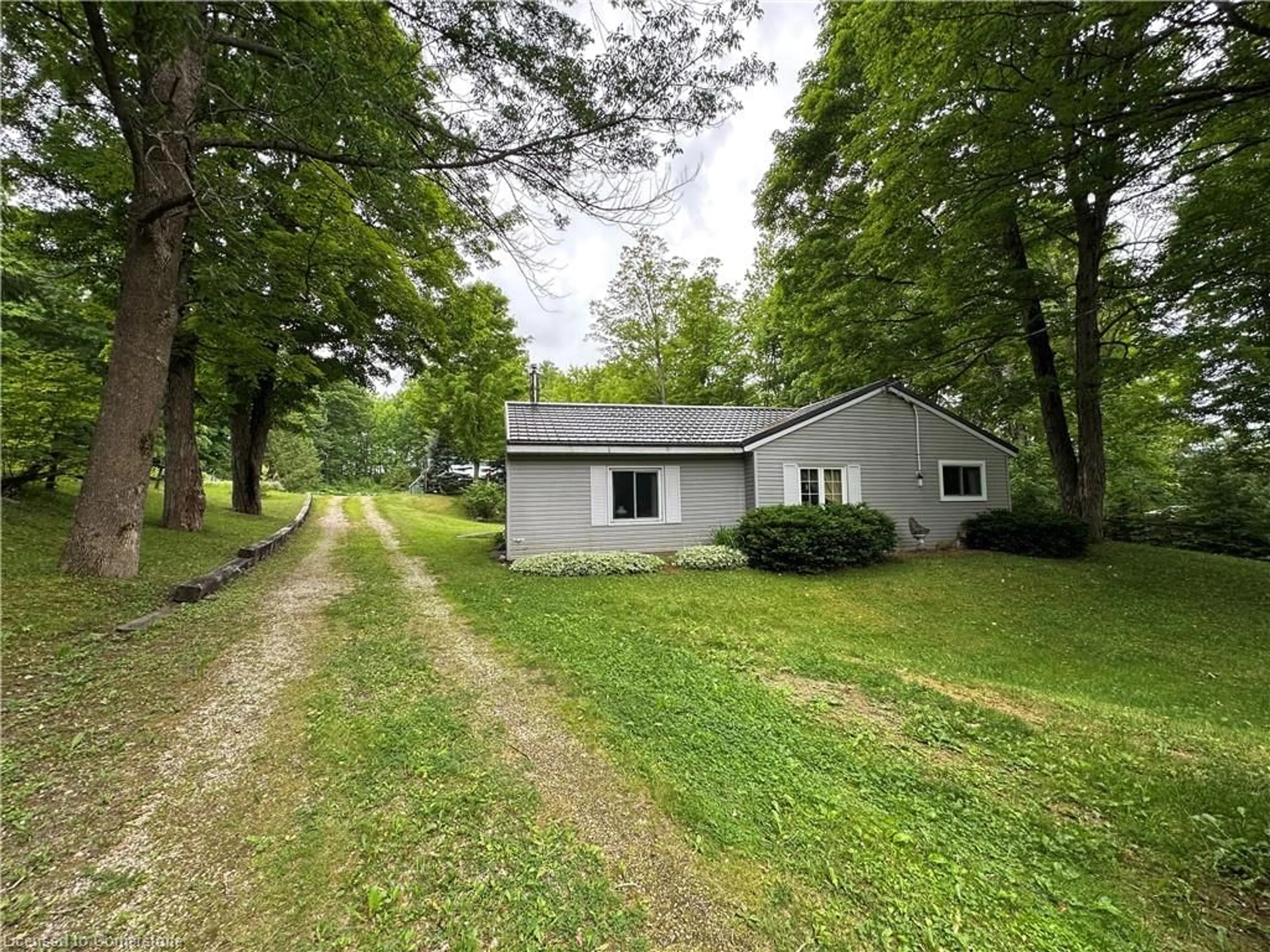 A pic from outside/outdoor area/front of a property/back of a property/a pic from drone, forest/trees view for 263076 Wilder Lake Rd, Southgate Ontario N0G 1R0
