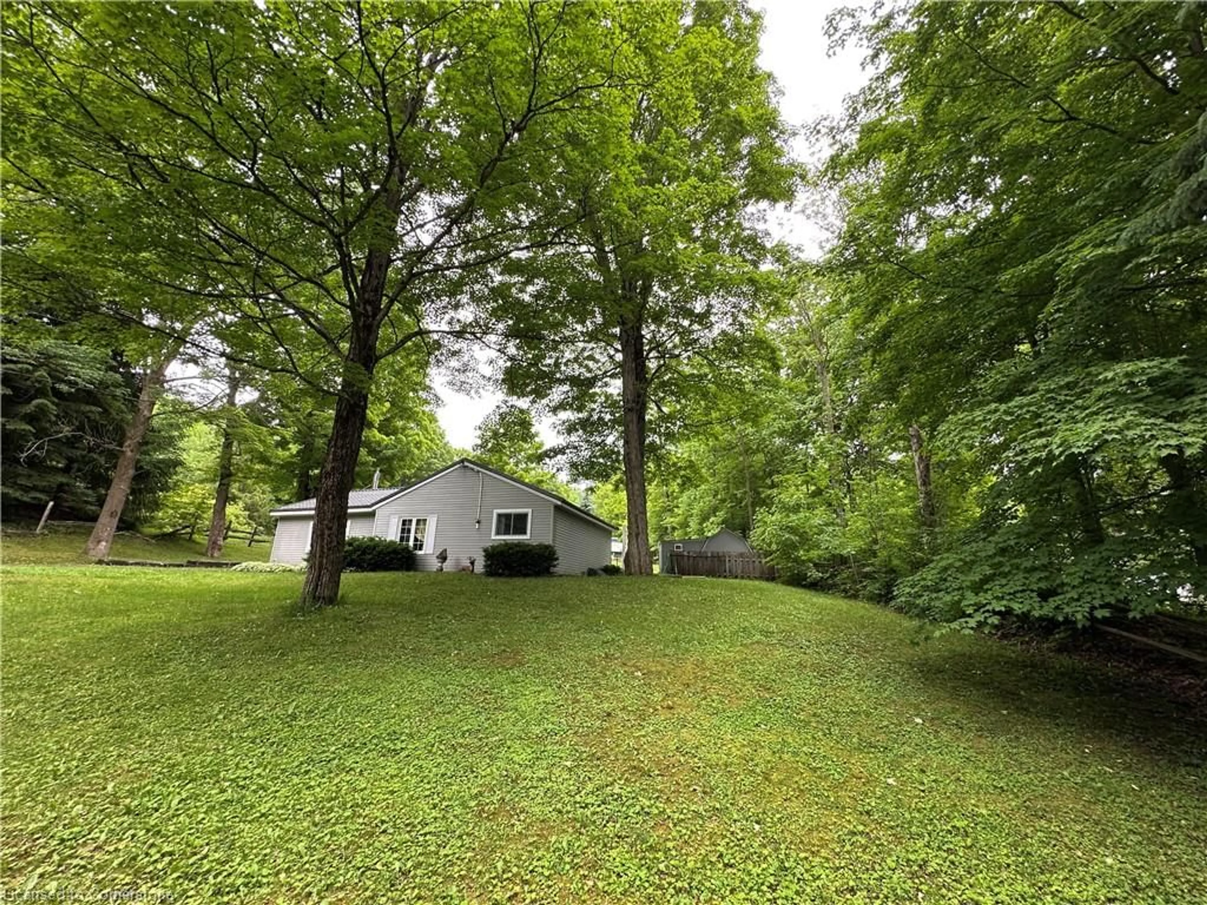 A pic from outside/outdoor area/front of a property/back of a property/a pic from drone, forest/trees view for 263076 Wilder Lake Rd, Southgate Ontario N0G 1R0