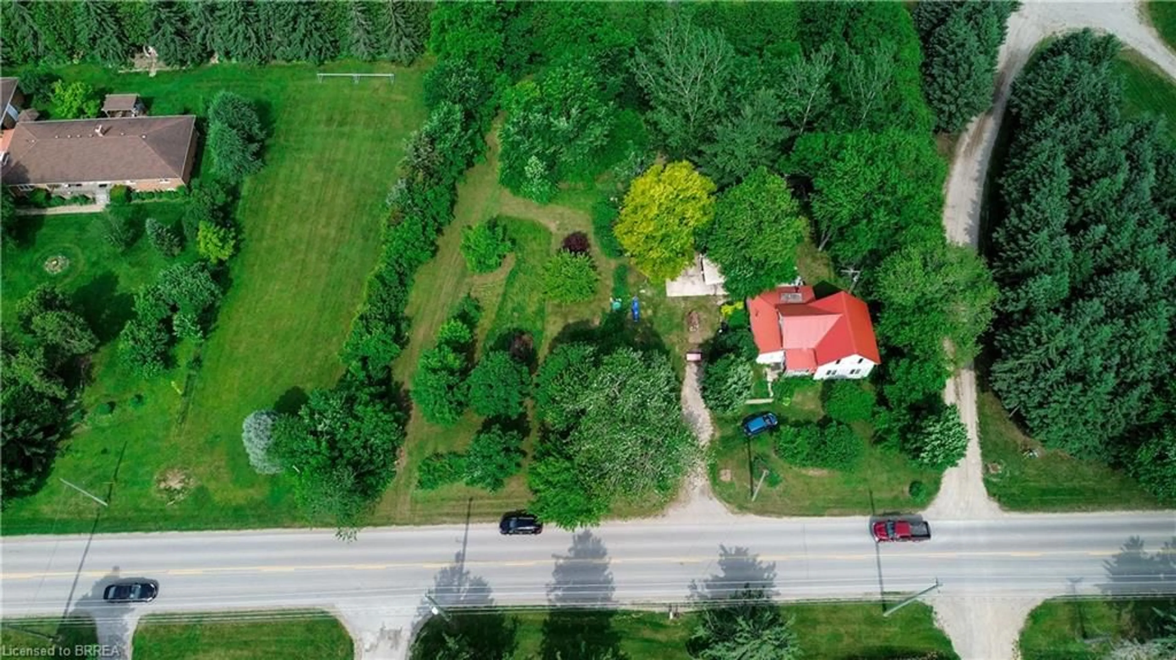 A pic from outside/outdoor area/front of a property/back of a property/a pic from drone, street for 435 Pleasant Ridge Rd, Mount Pleasant Ontario N3T 5L5