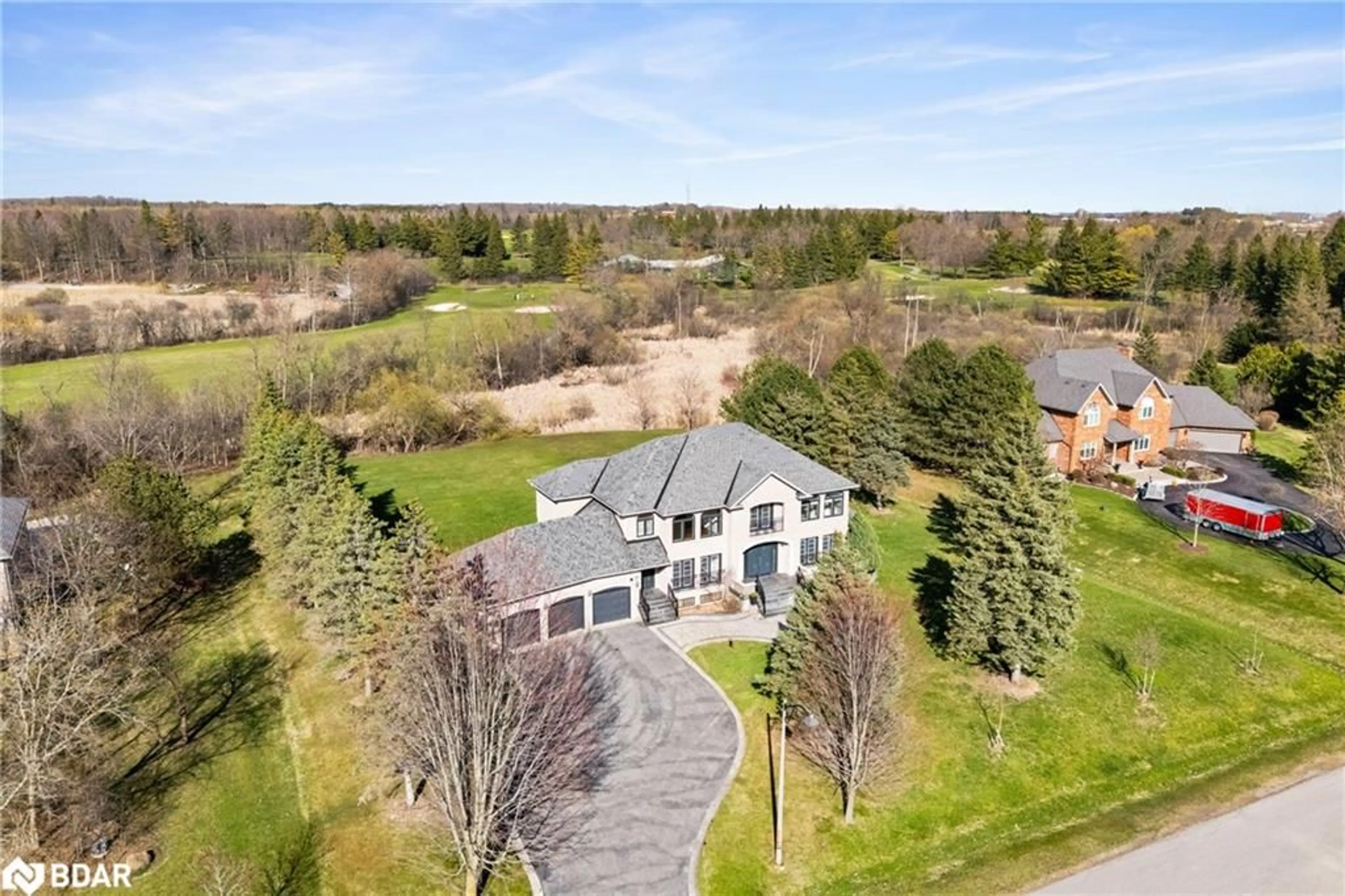 A pic from outside/outdoor area/front of a property/back of a property/a pic from drone, water/lake/river/ocean view for 19 Logan Crt, Stouffville Ontario L4A 3T6