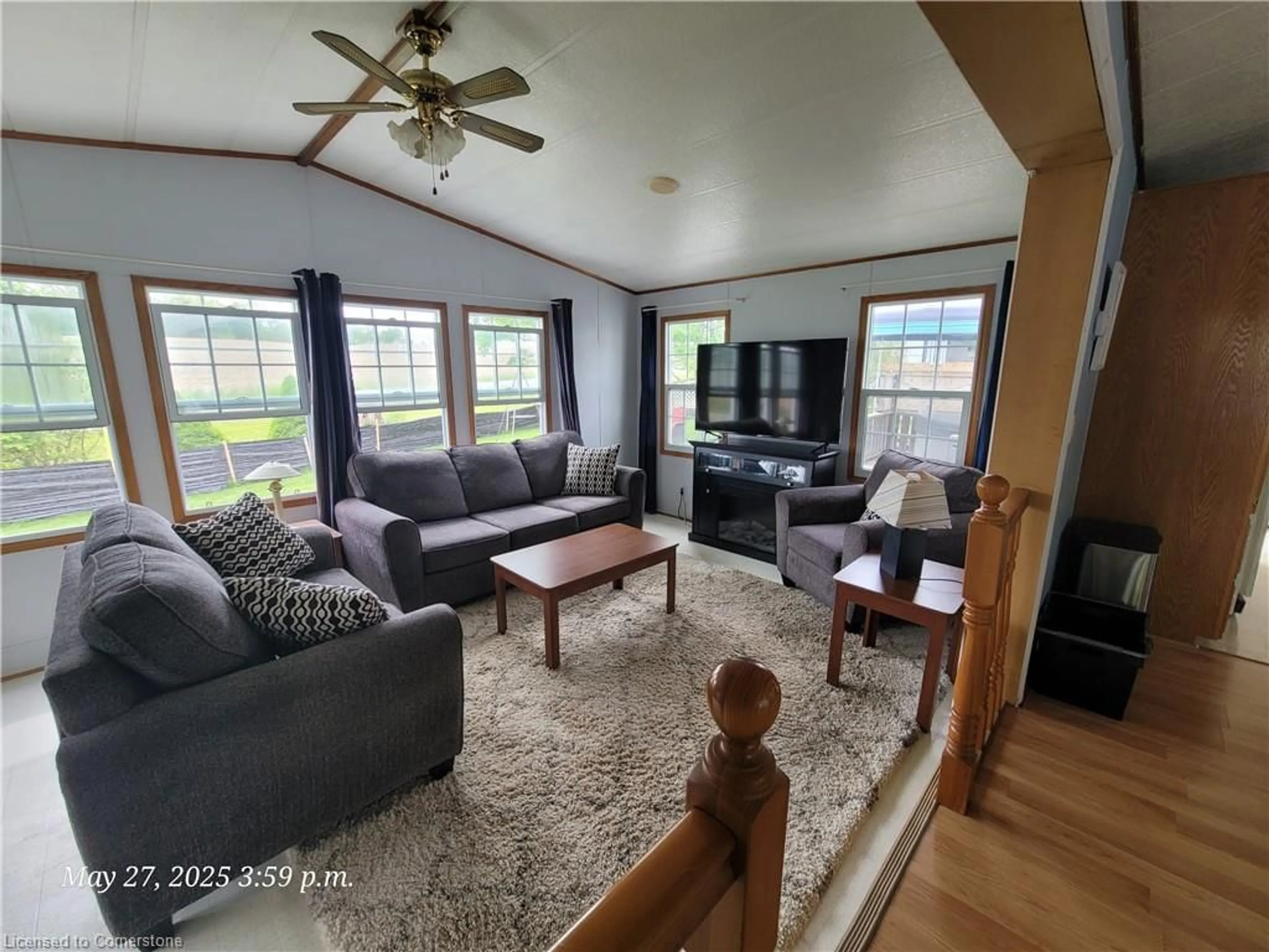 Living room with furniture, wood/laminate floor for 580 Beaver Creek Rd #62, Waterloo Ontario N2J 3Z4