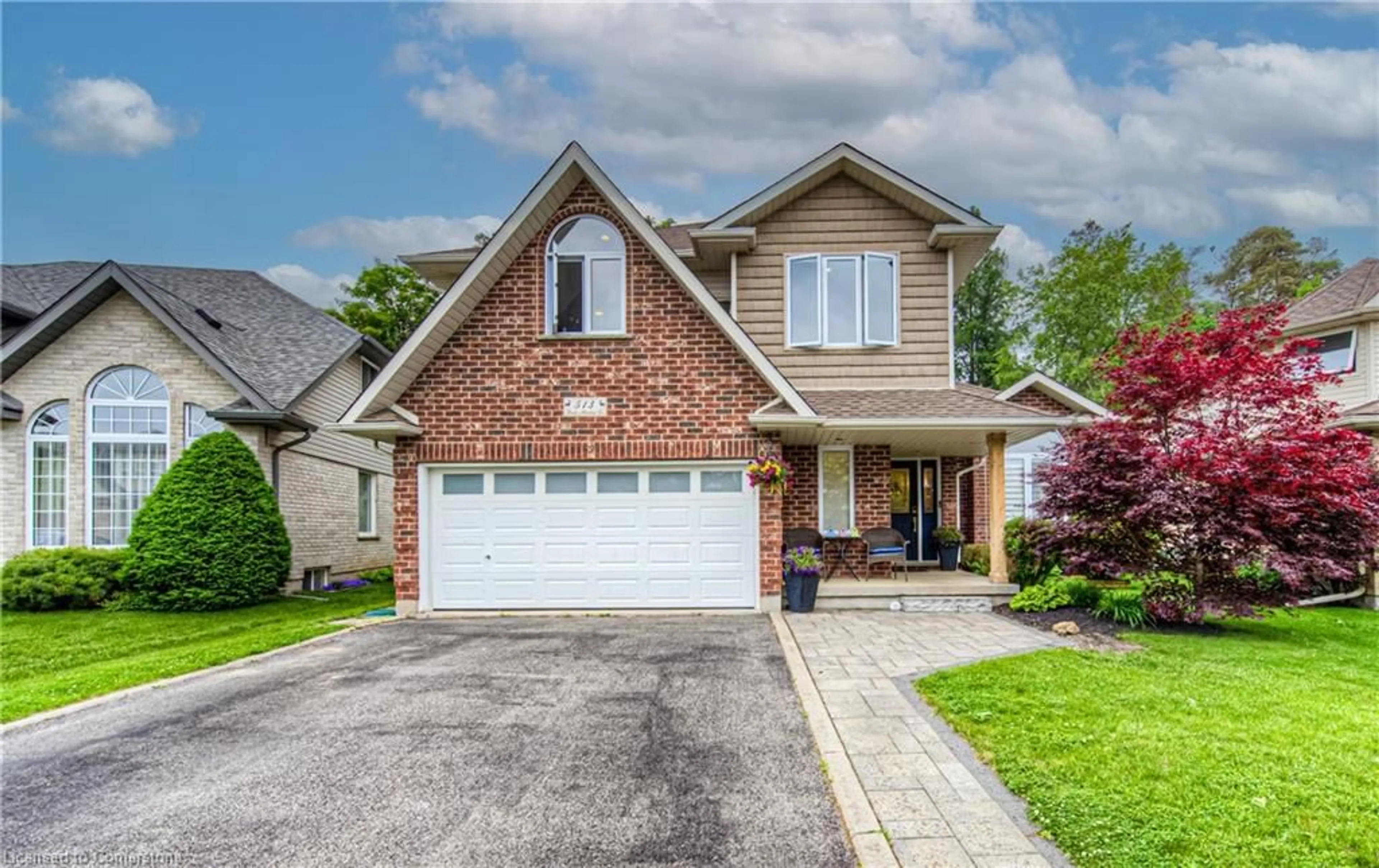 Home with brick exterior material, street for 513 Rush Meadow Cres, Kitchener Ontario N2R 1T2
