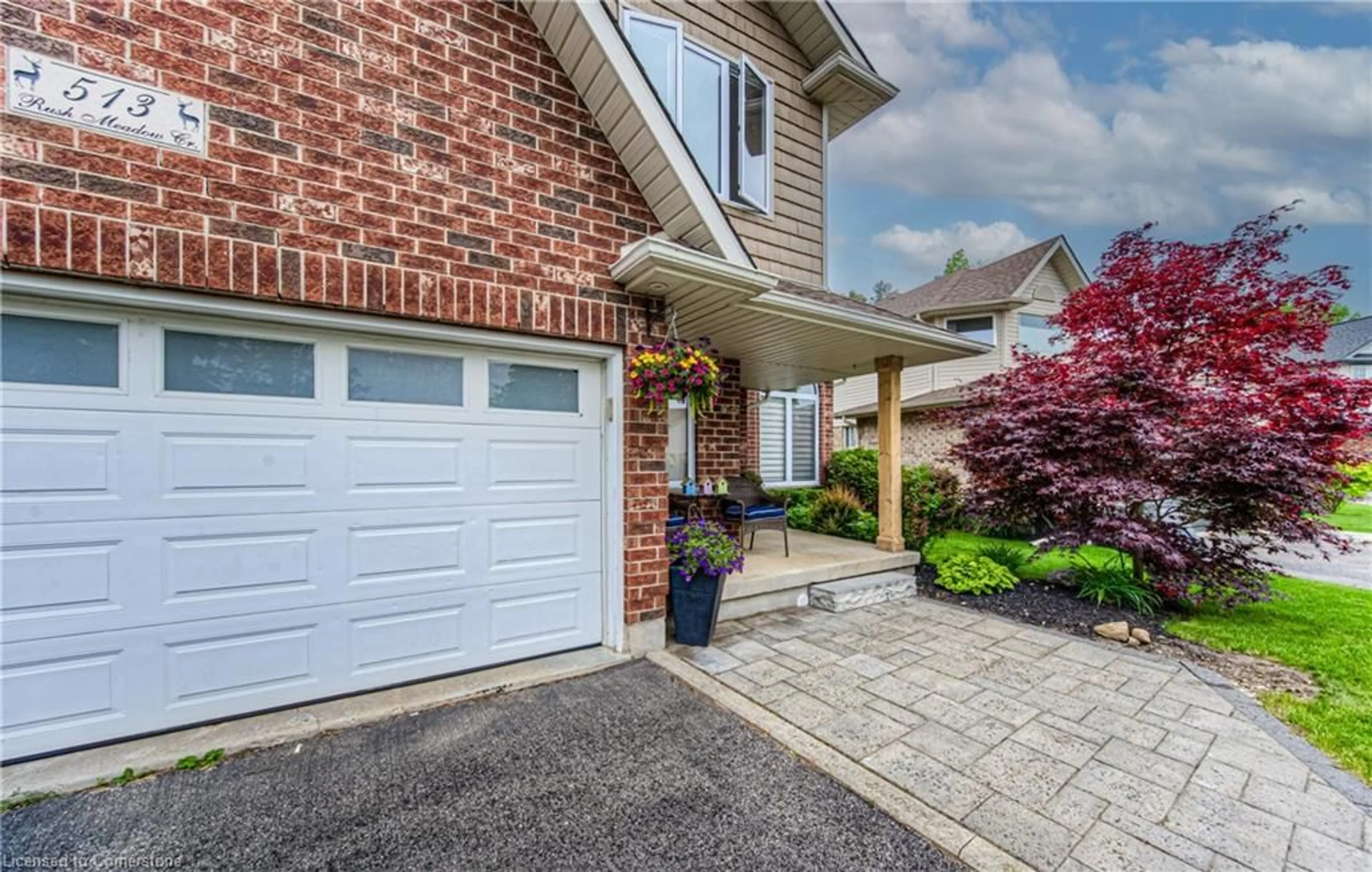 Home with brick exterior material, street for 513 Rush Meadow Cres, Kitchener Ontario N2R 1T2