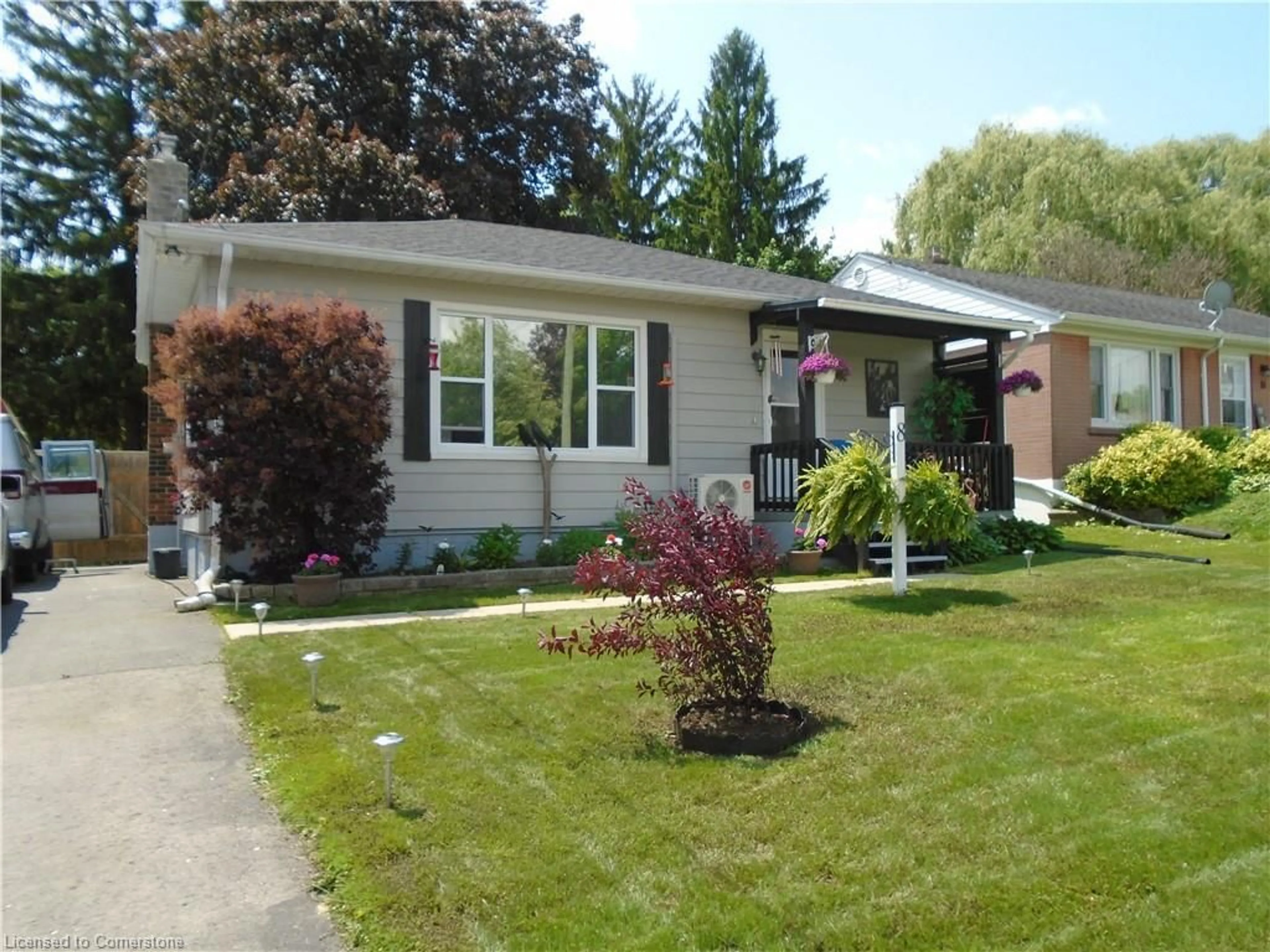 Home with vinyl exterior material, street for 8 Tyrell St, Simcoe Ontario N3Y 2H1