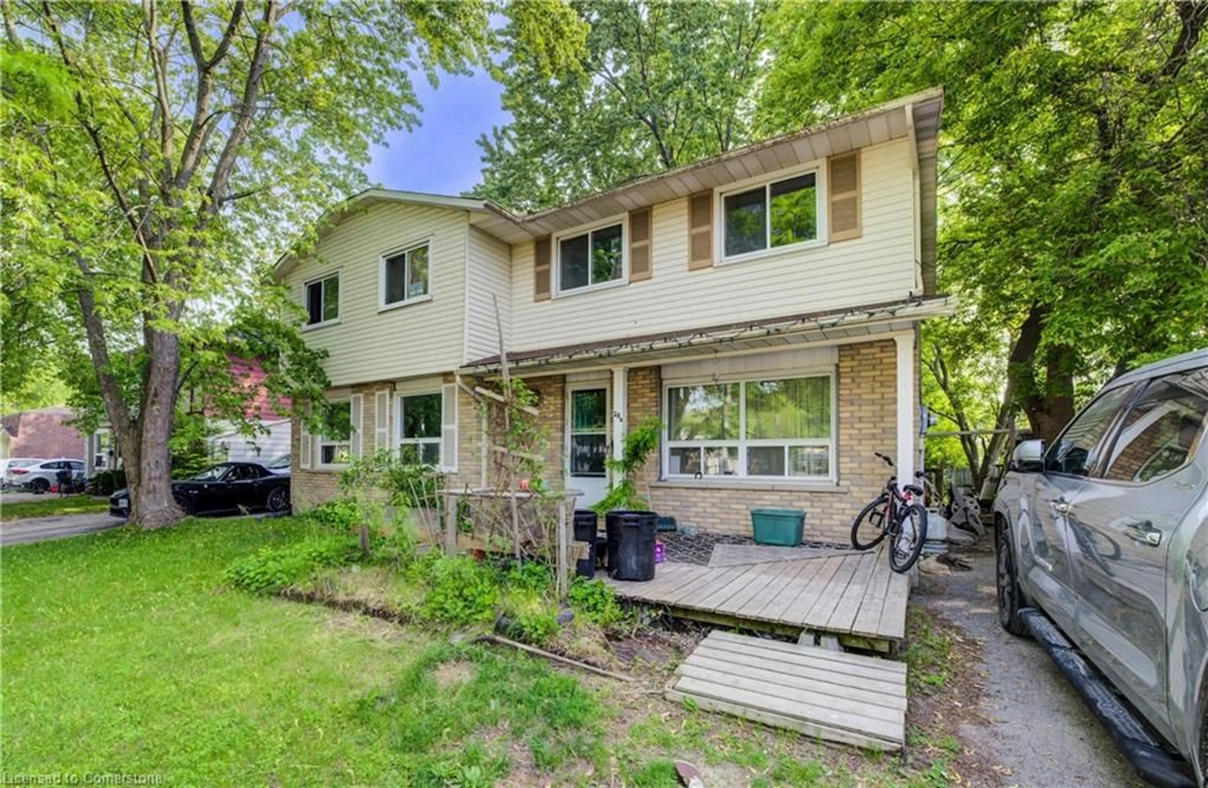 Home with brick exterior material, street for 28 Amos Ave #A&B, Waterloo Ontario N2L 5G3