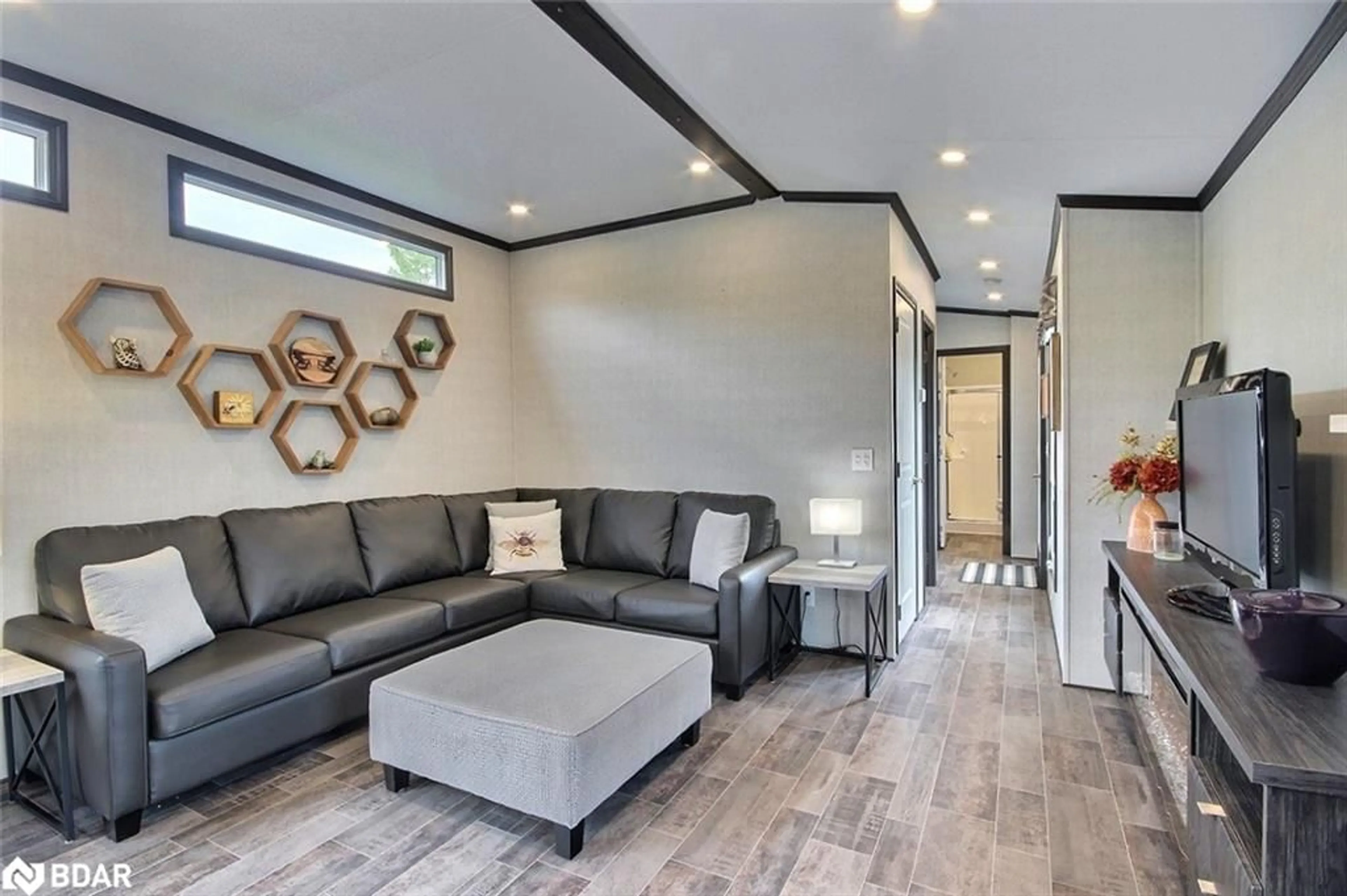 Living room with furniture, unknown for 3500 Lauderdale Pt Cres #31, Port Severn Ontario P0E 1N0