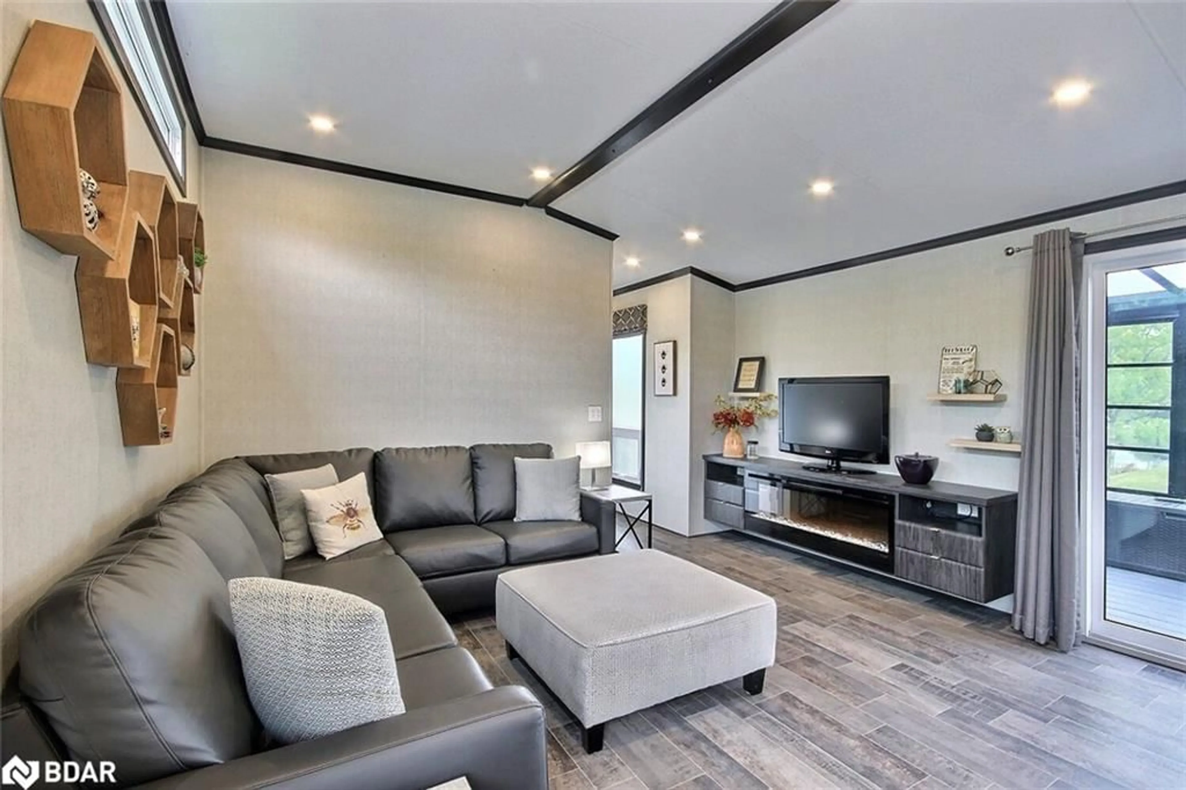 Living room with furniture, unknown for 3500 Lauderdale Pt Cres #31, Port Severn Ontario P0E 1N0