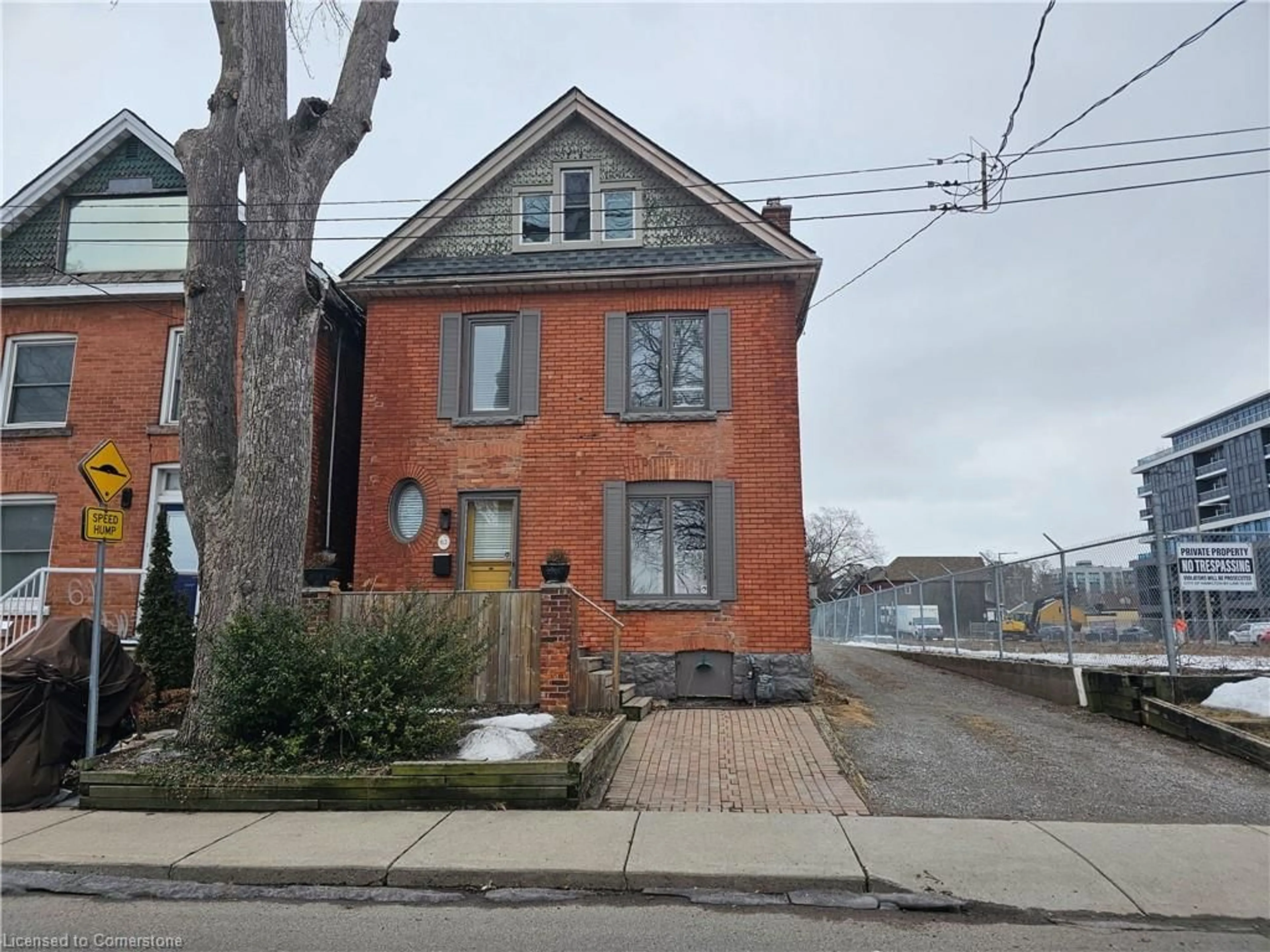 Home with brick exterior material, street for 63 New St, Hamilton Ontario L8P 4J7