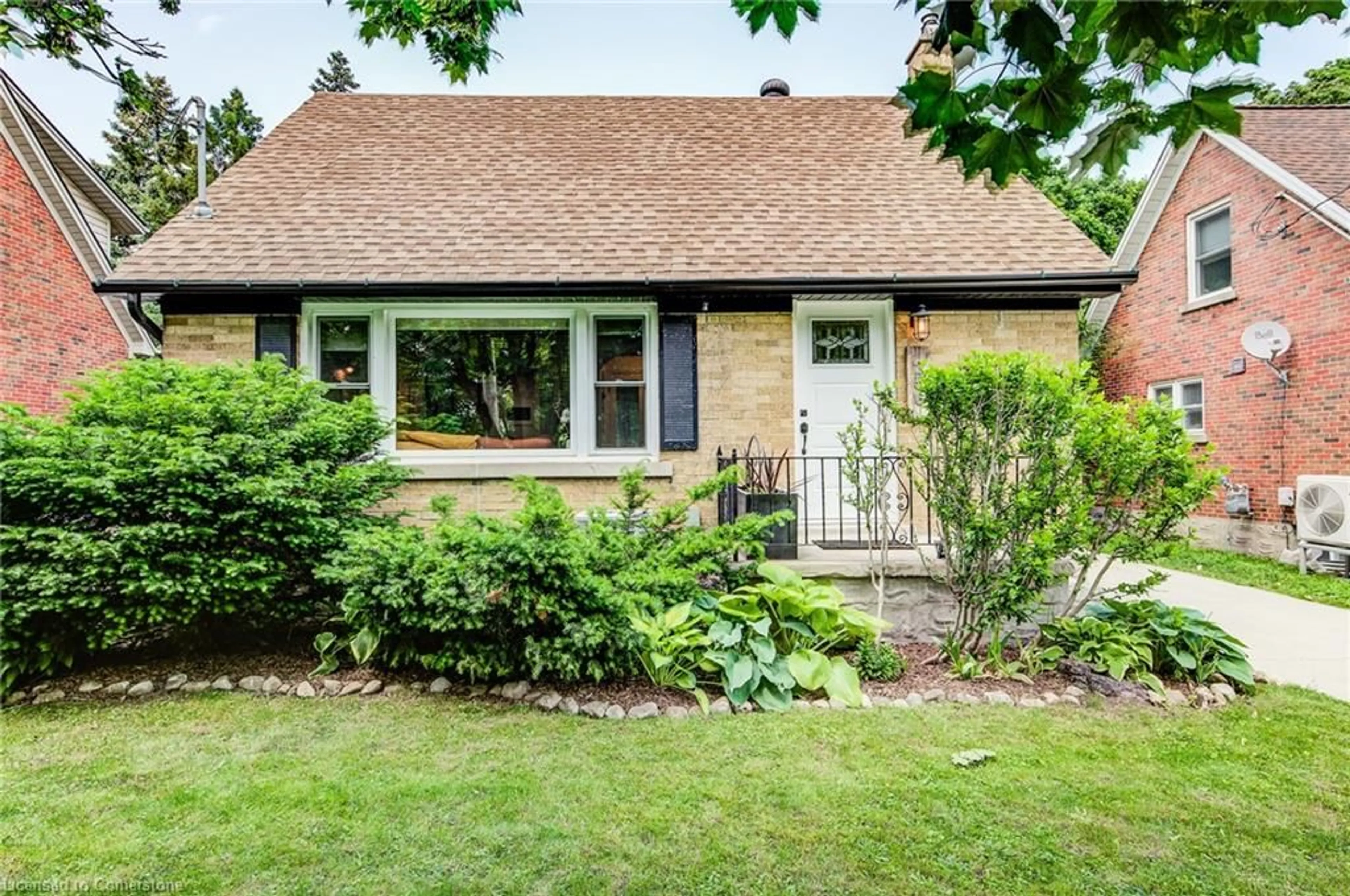 Home with brick exterior material, street for 256 Mansion St, Kitchener Ontario N2H 2K7