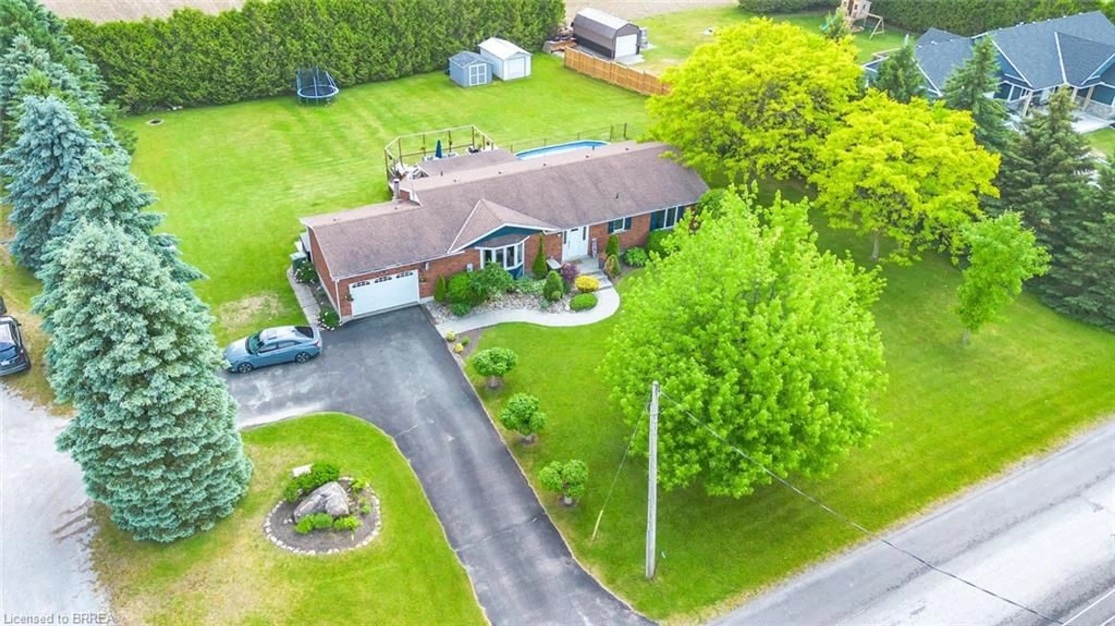A pic from outside/outdoor area/front of a property/back of a property/a pic from drone, street for 352 Concession 6 Townsend Rd, Simcoe Ontario N0E 1Y0