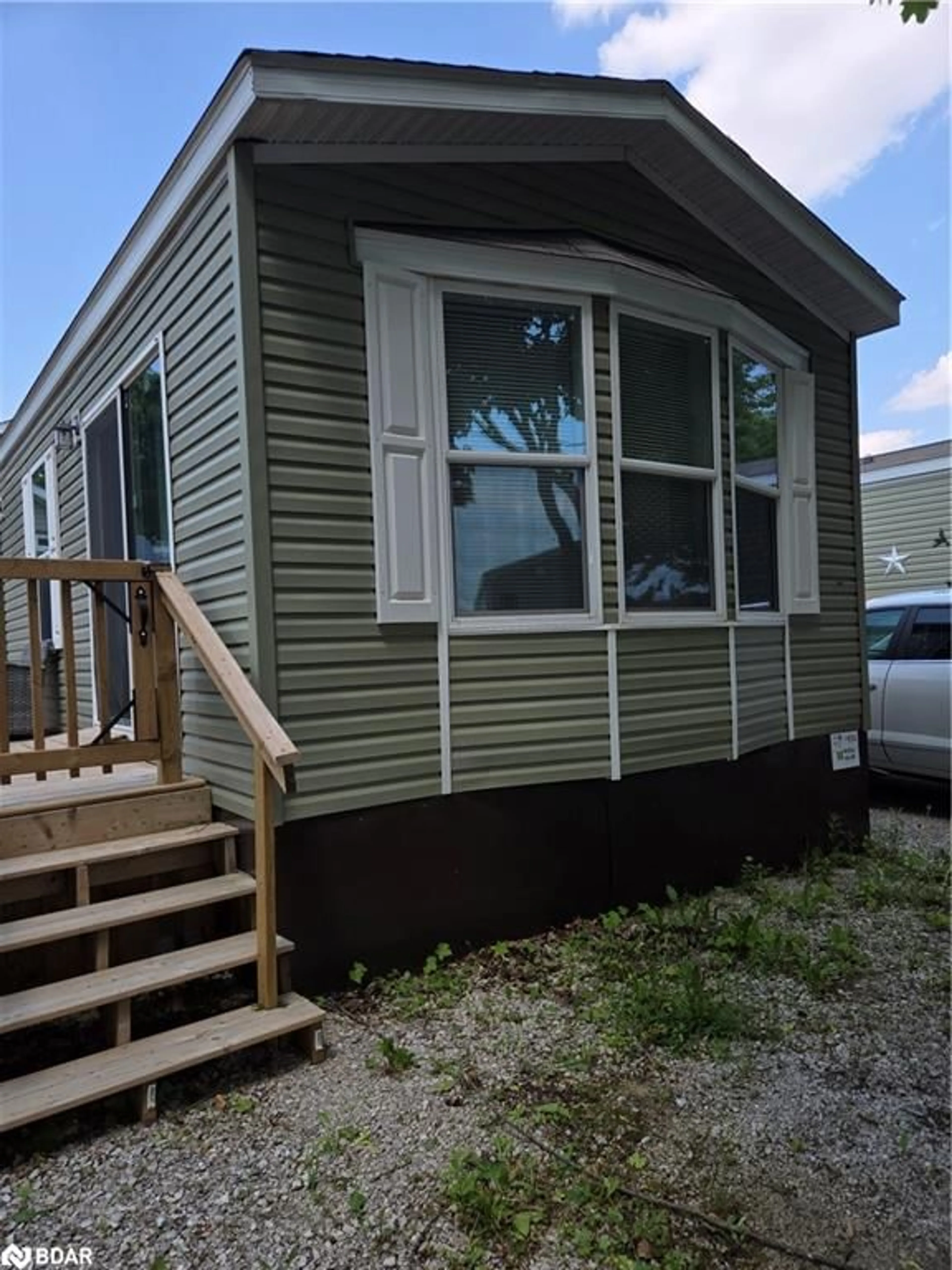 Home with vinyl exterior material, street for 99 Fourth Concession Rd #614, Burford Ontario N0E 1A0