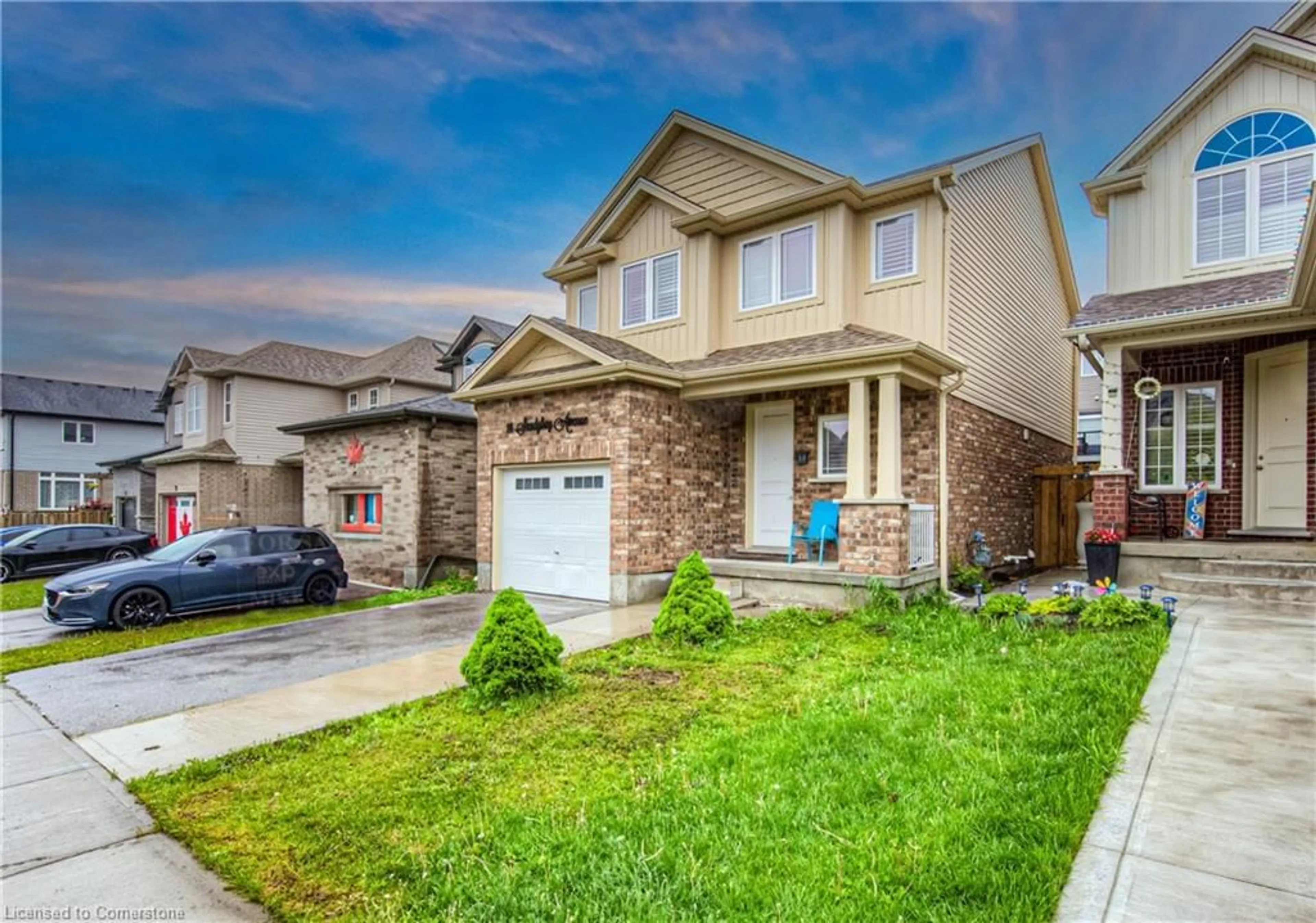 Home with brick exterior material, street for 14 Sandybay Ave, Kitchener Ontario N2A 0H7