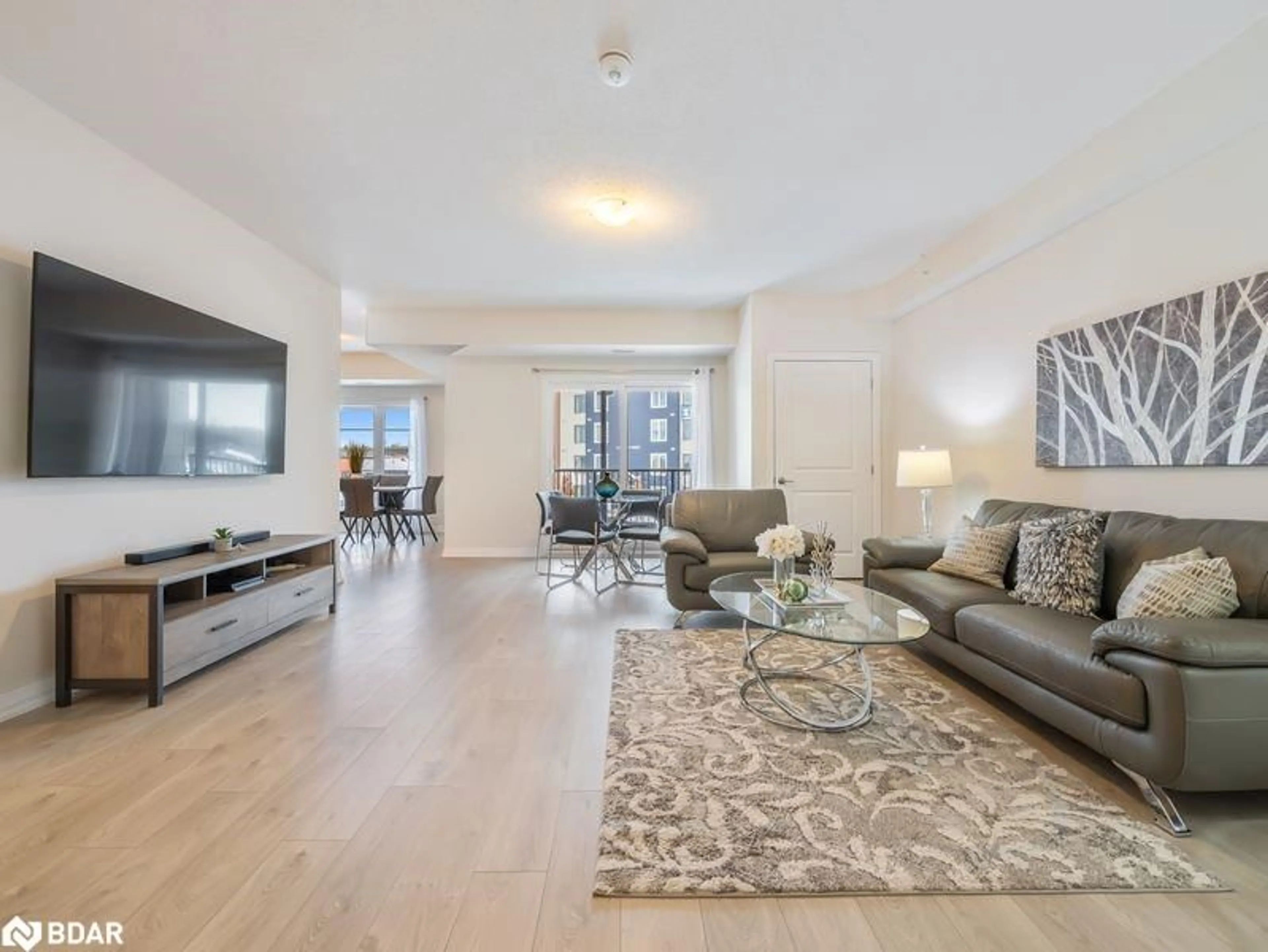 Living room with furniture, unknown for 20 Koda St #211, Barrie Ontario L9J 0J7