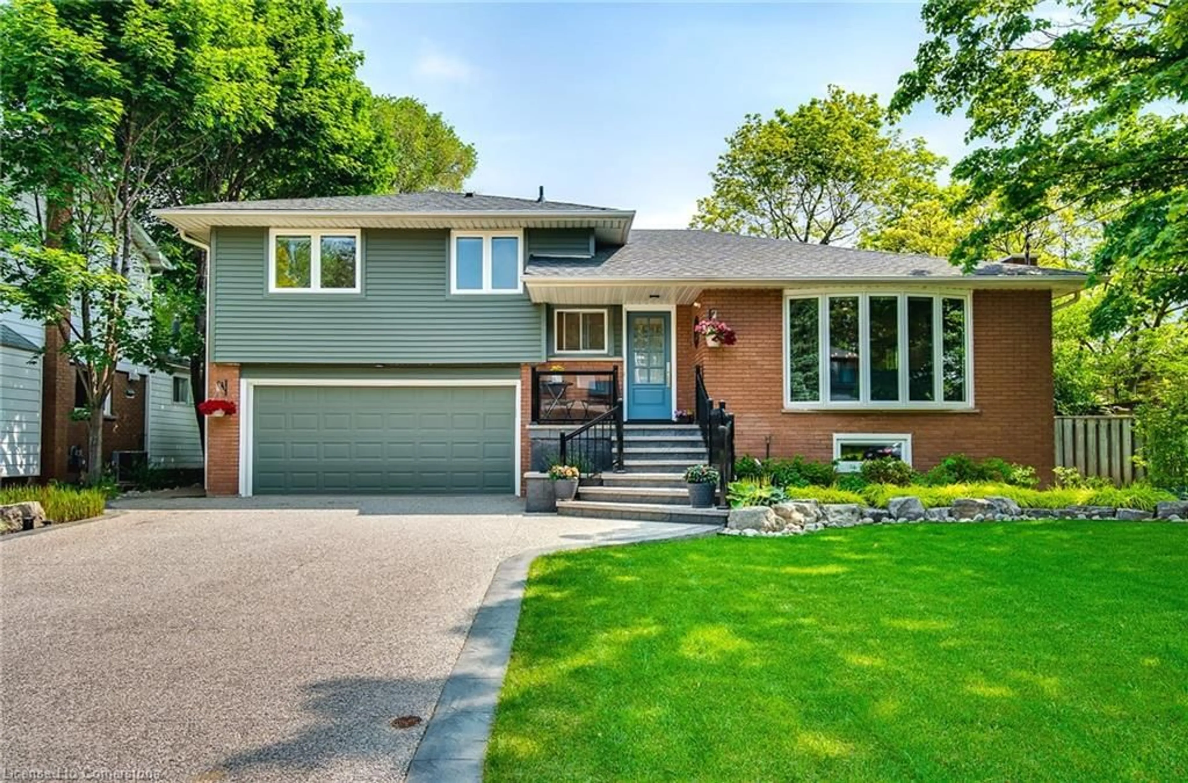 Home with brick exterior material, street for 421 Southland Cres, Oakville Ontario L6L 3N9