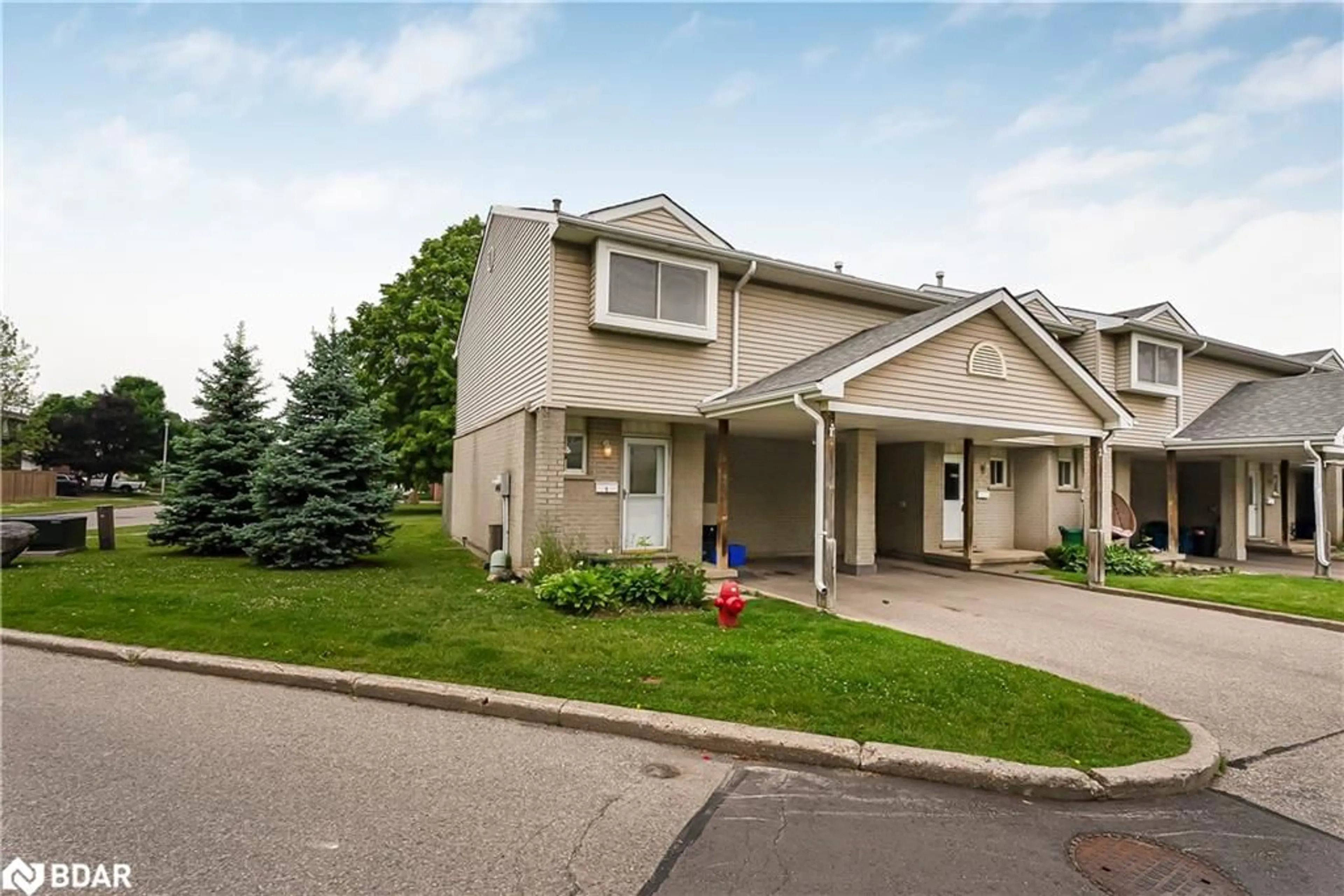 Home with vinyl exterior material, street for 125 Sekura Cres #1, Cambridge Ontario N1R 8B4
