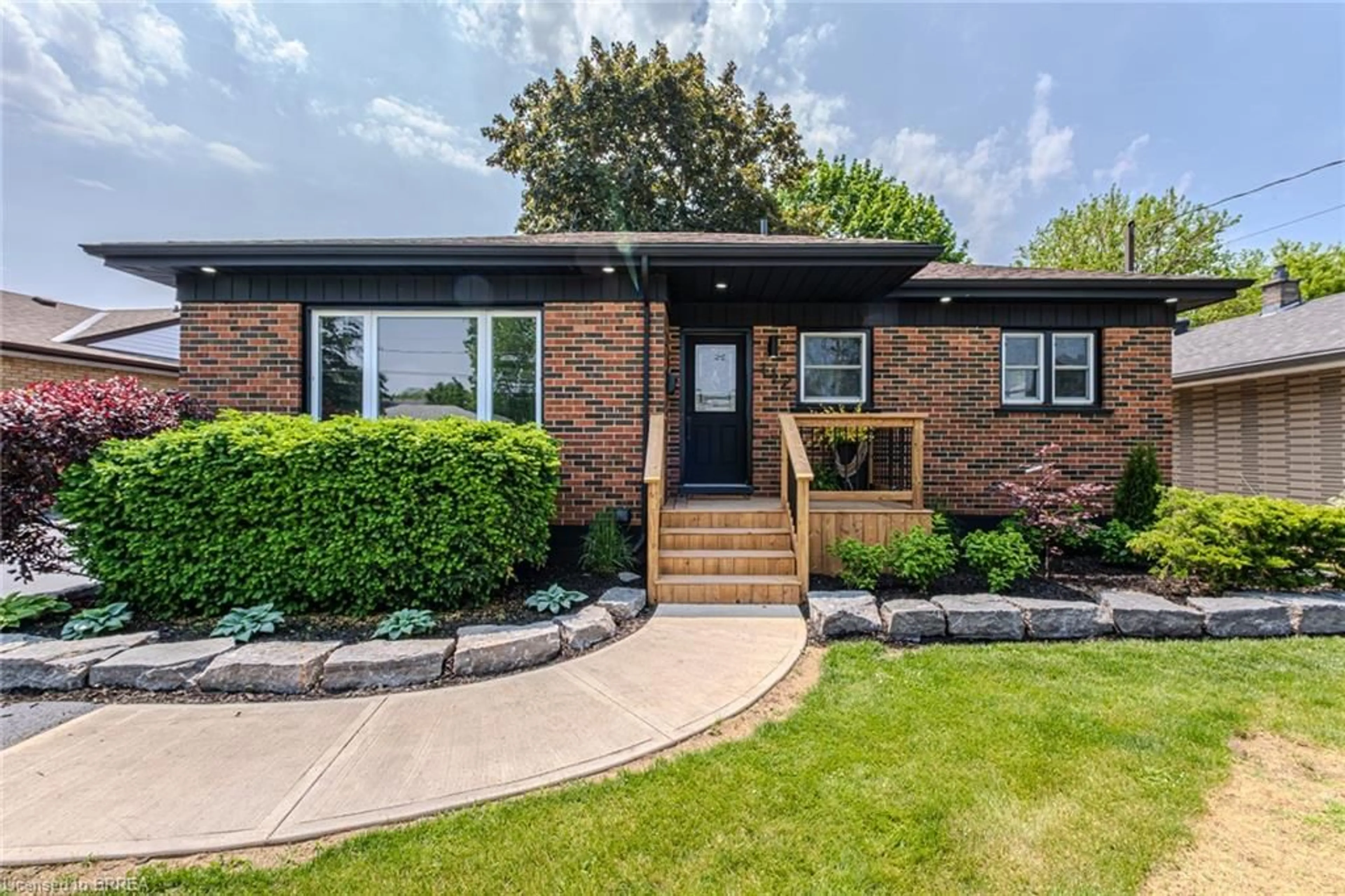 Home with brick exterior material, street for 112 Wood St, Brantford Ontario N3R 2L3