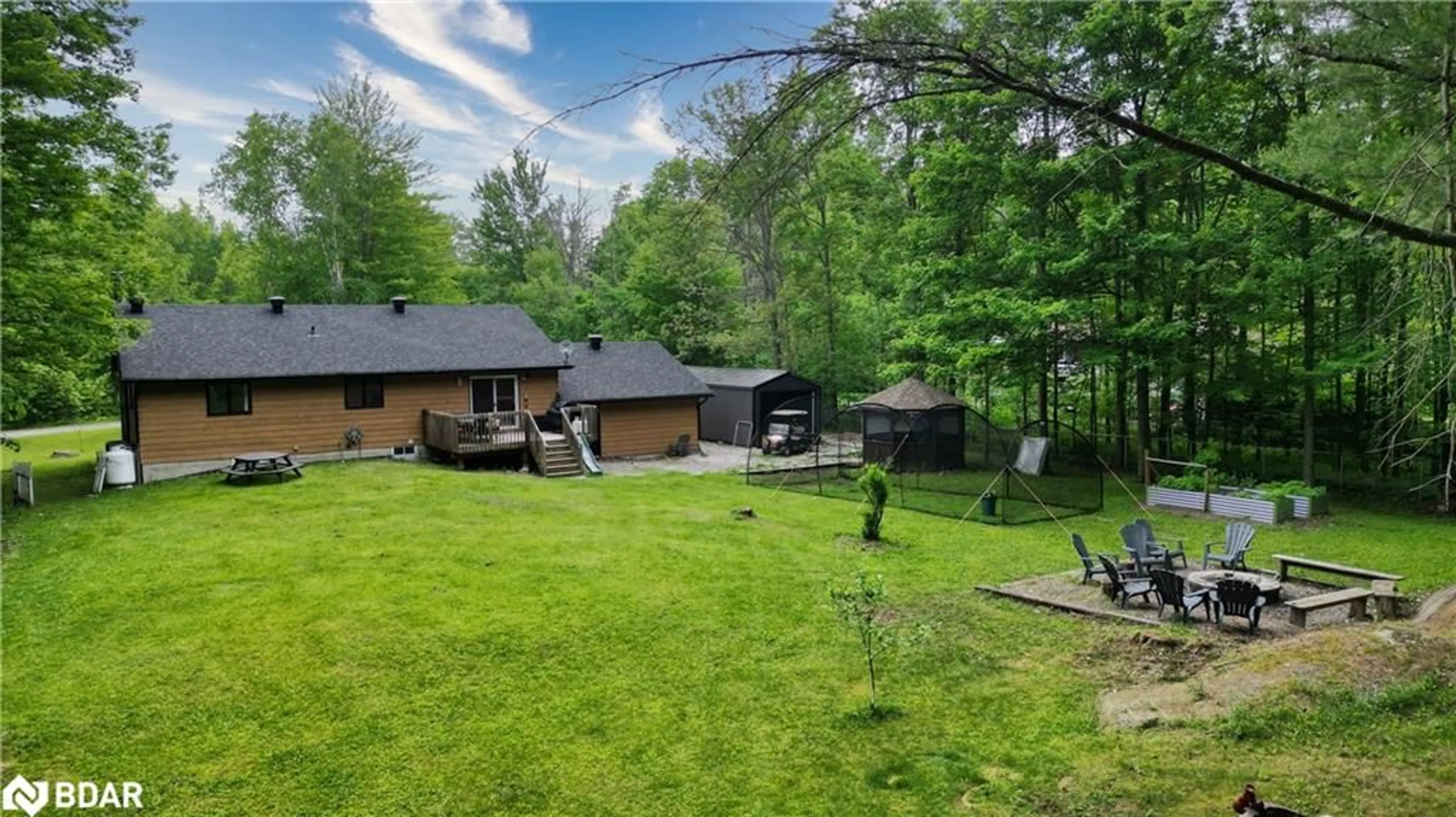 A pic from outside/outdoor area/front of a property/back of a property/a pic from drone, forest/trees view for 4557 Trent Trail, Washago Ontario L0K 2B0
