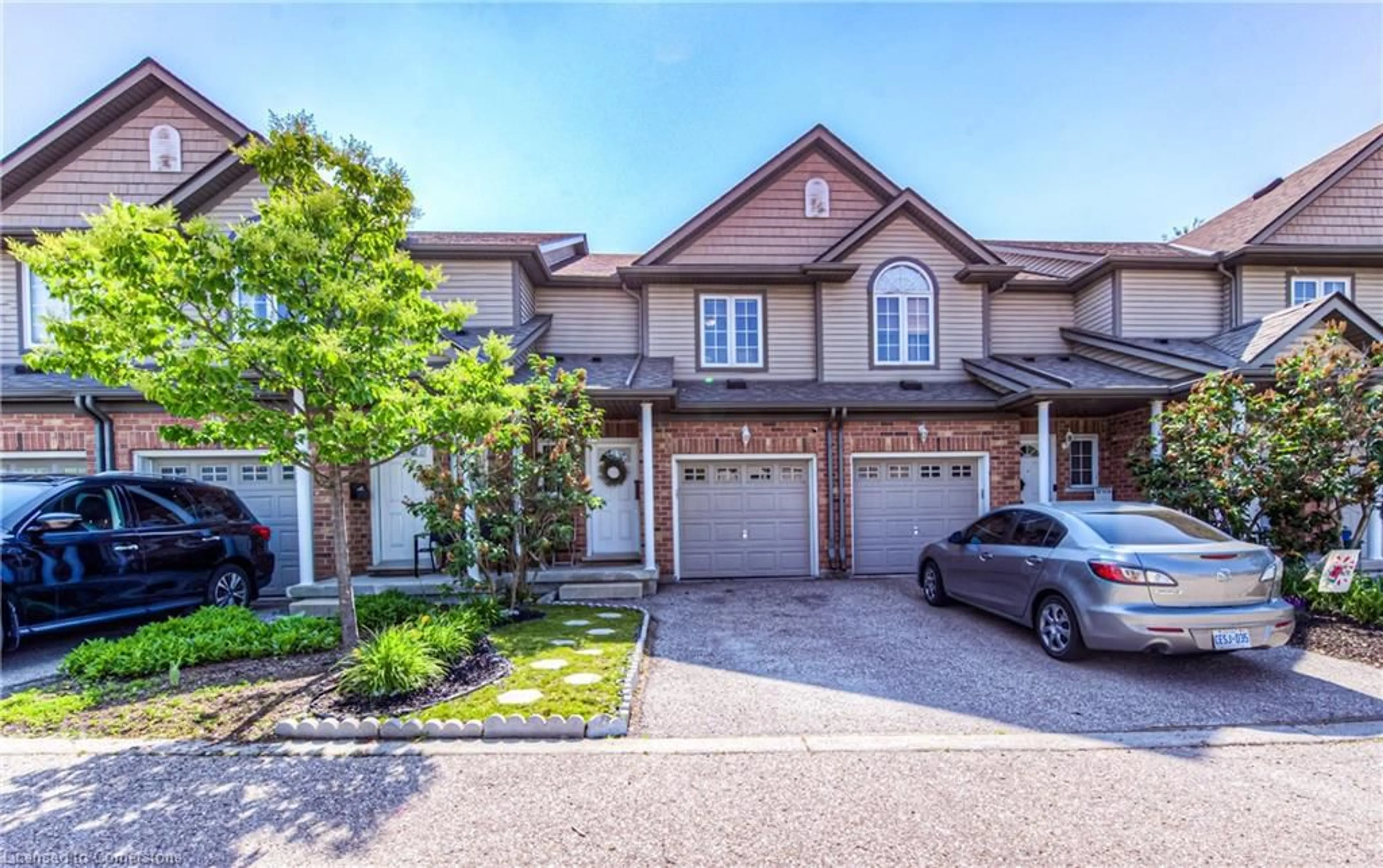 Home with brick exterior material, street for 972 Strasburg Rd #4, Kitchener Ontario N2E 2K4
