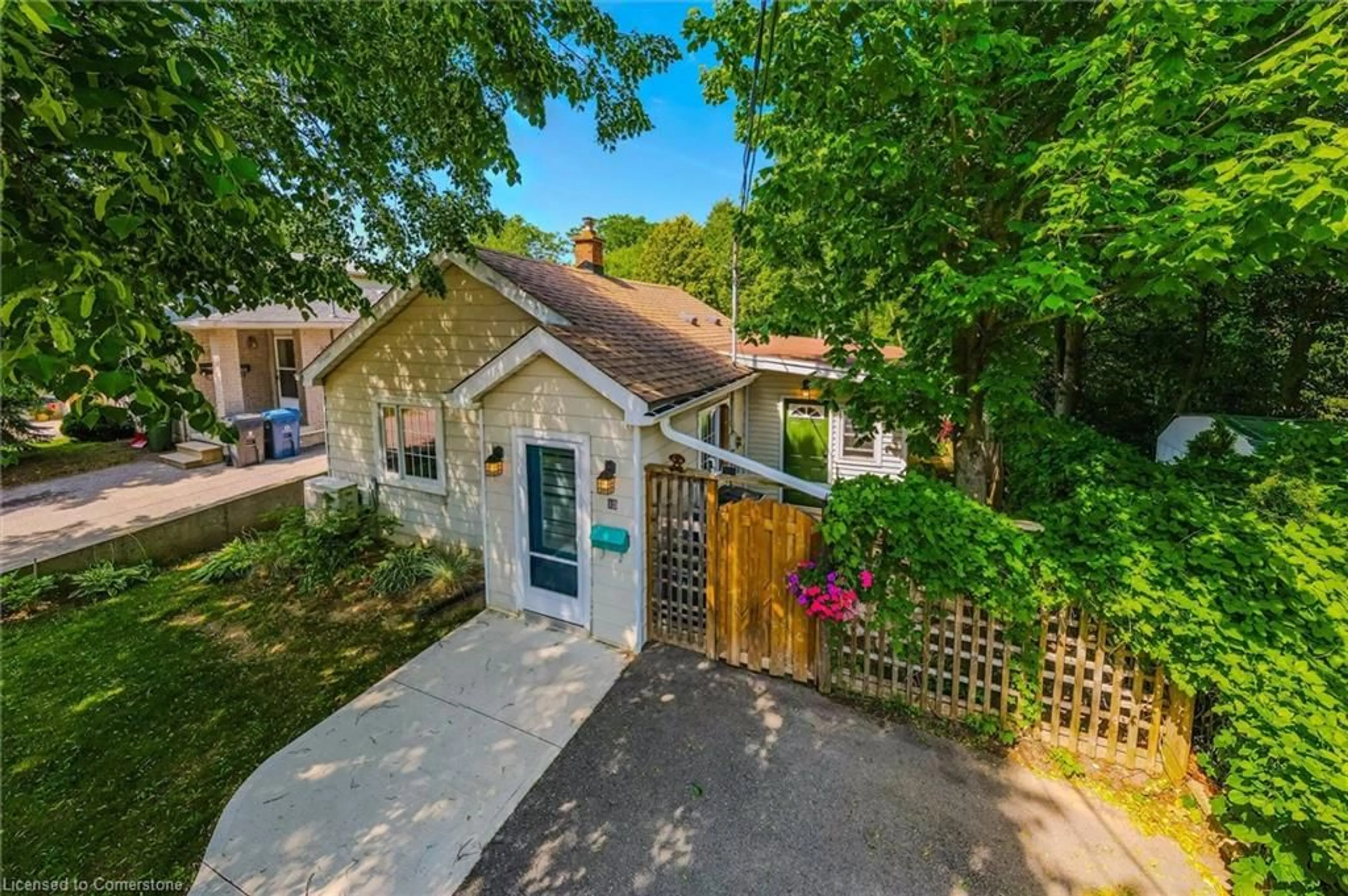 A pic from outside/outdoor area/front of a property/back of a property/a pic from drone, street for 15 Laurine Ave, Guelph Ontario N1E 4N1