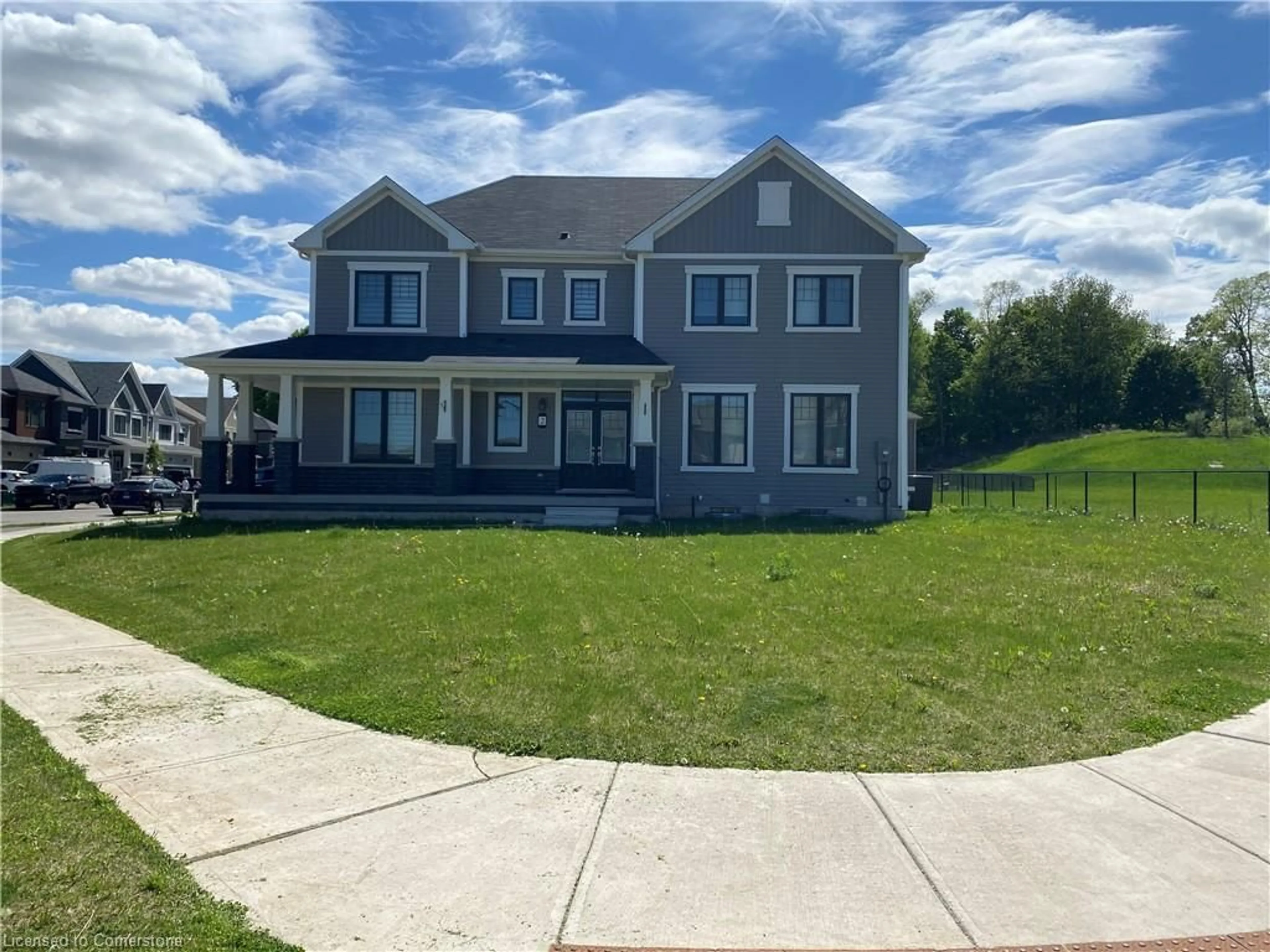 Home with vinyl exterior material, street for 2 Cahill Drive Dr, Brantford Ontario N3T 0V5