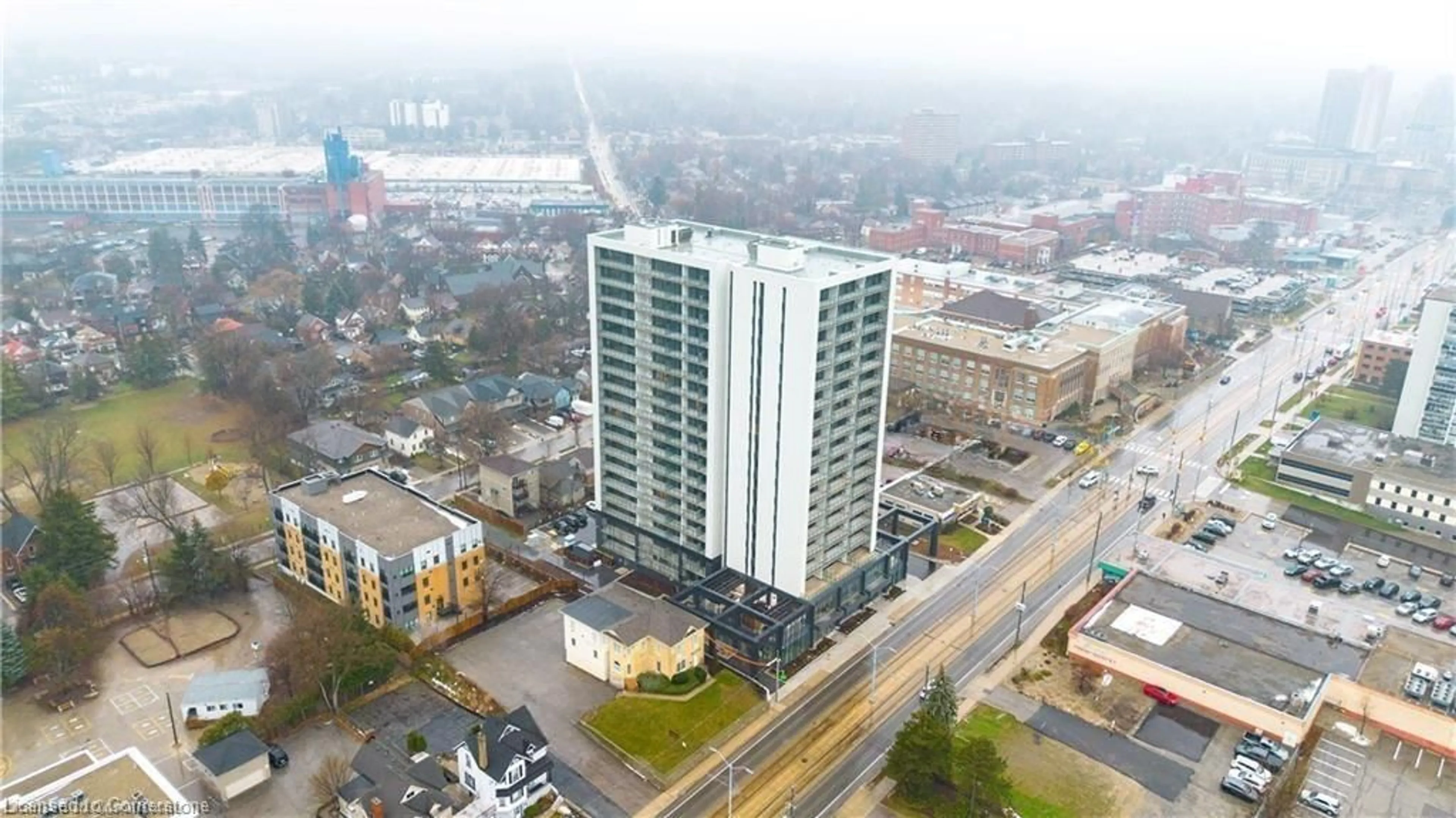 A pic from outside/outdoor area/front of a property/back of a property/a pic from drone, city buildings view from balcony for 741 King St #103, Kitchener Ontario N2G 0E9