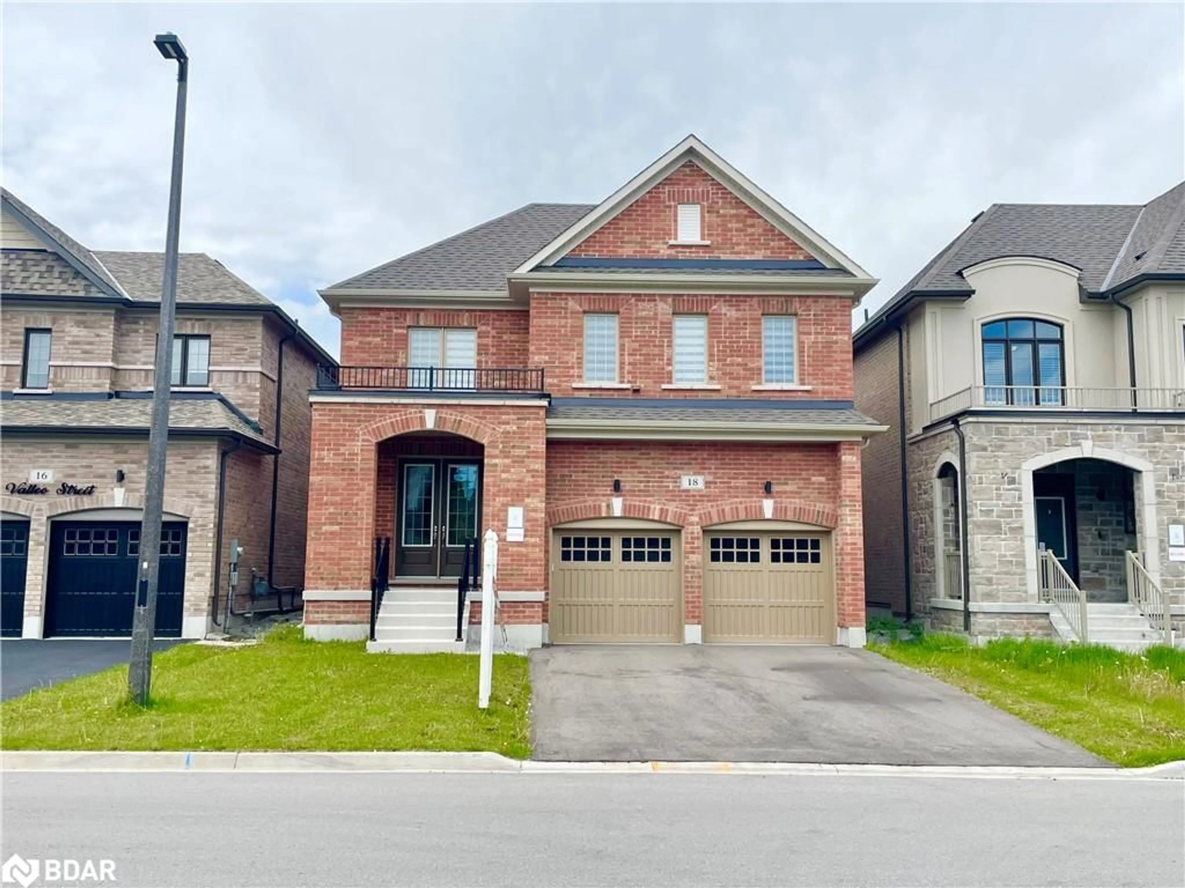 Home with brick exterior material, street for 18 Valleo Street, Keswick Ontario L4P 0J9
