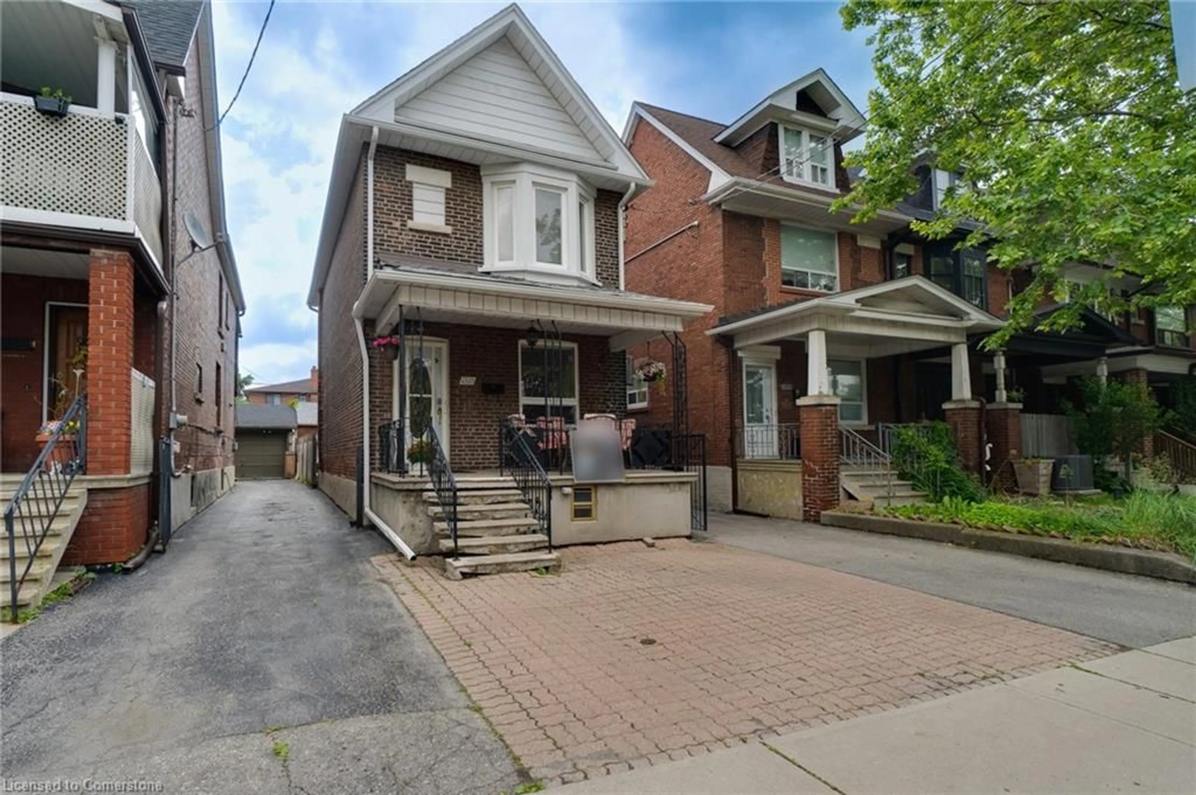 Home with brick exterior material, street for 1315 Lansdowne St, Toronto Ontario M6H 3Z9