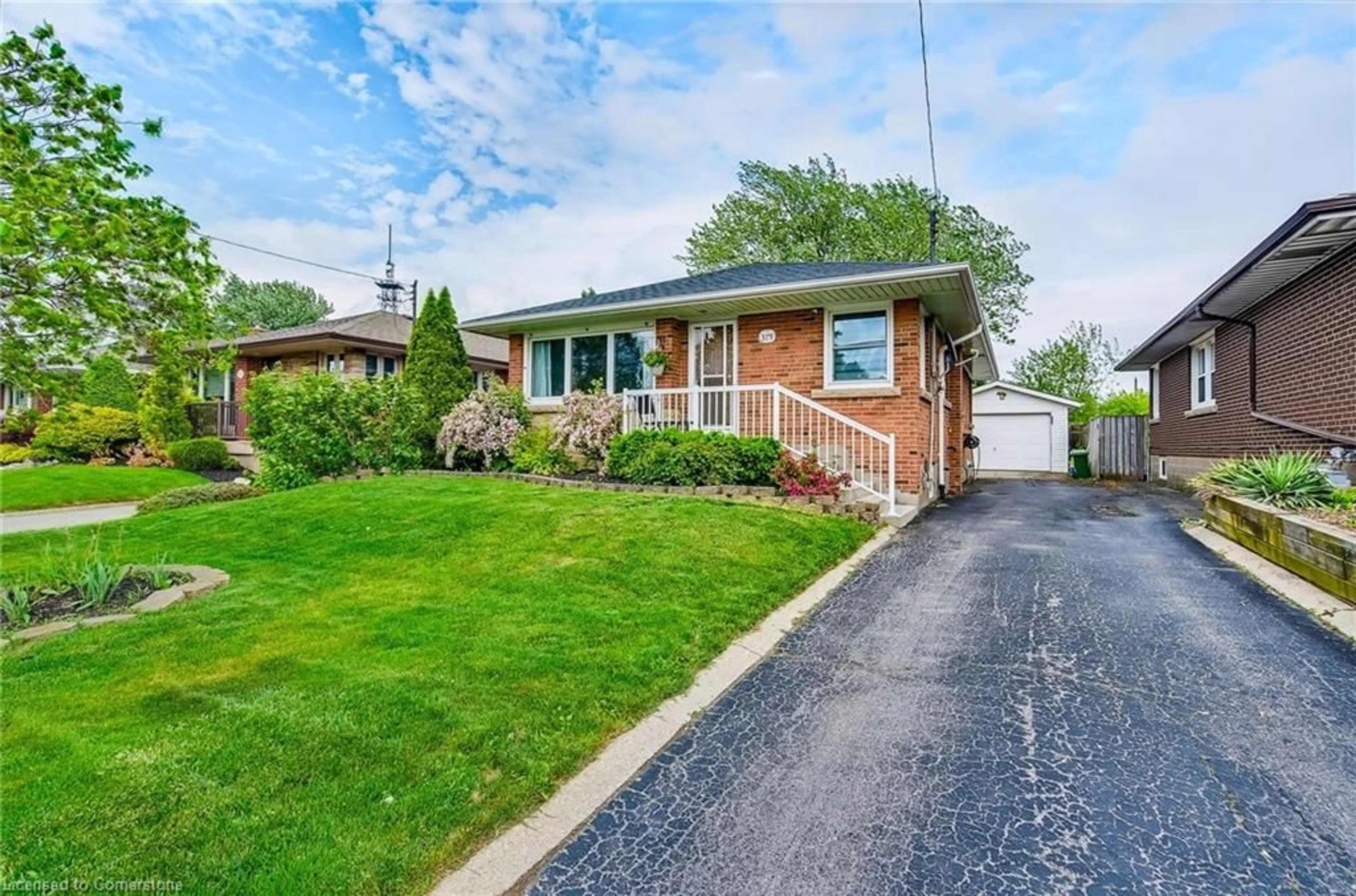 Home with brick exterior material, street for 379 East 18th St, Hamilton Ontario L9A 4P7