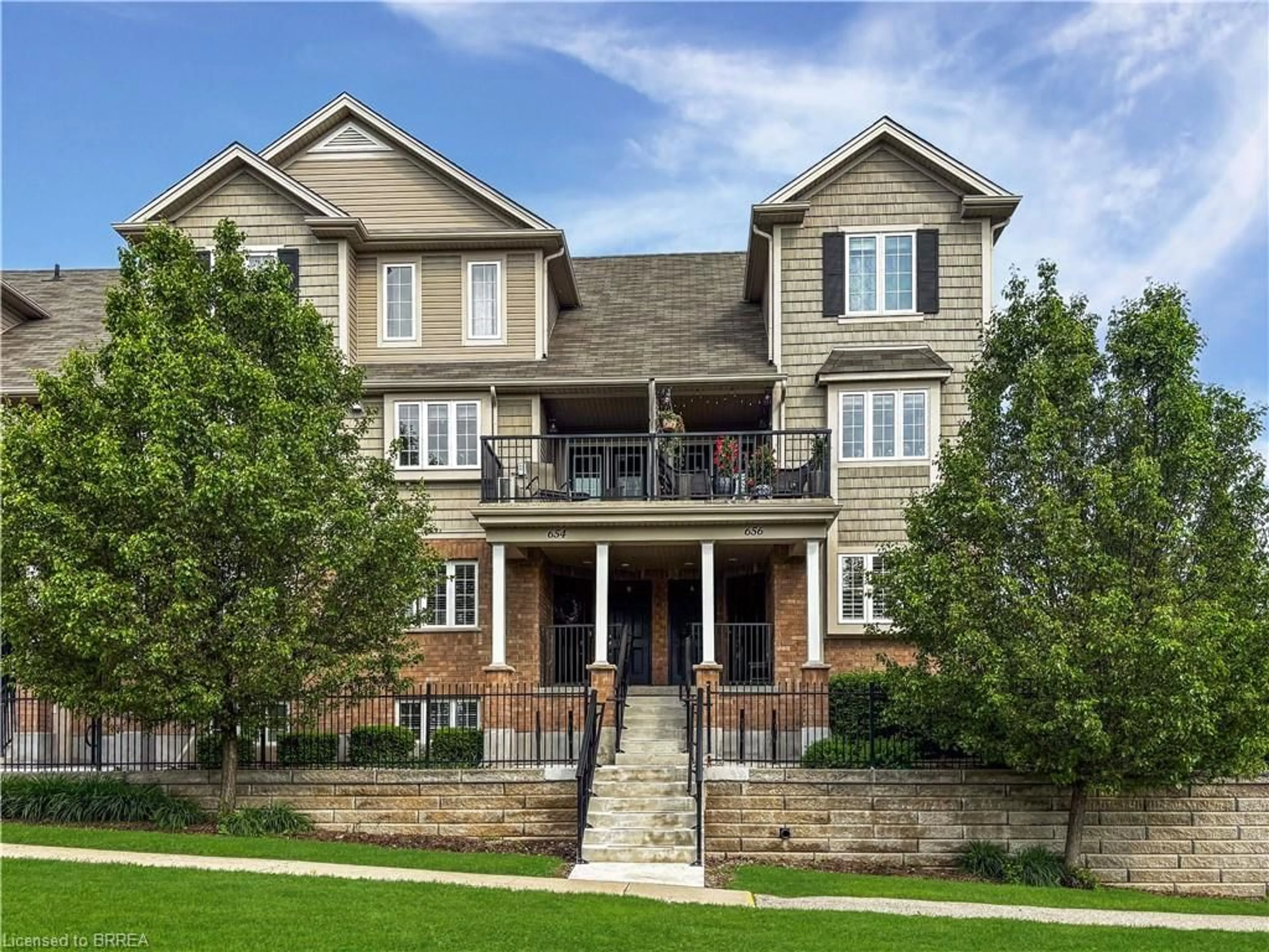 Home with brick exterior material, unknown for 656 Woodlawn Rd #B, Guelph Ontario N1E 0K4