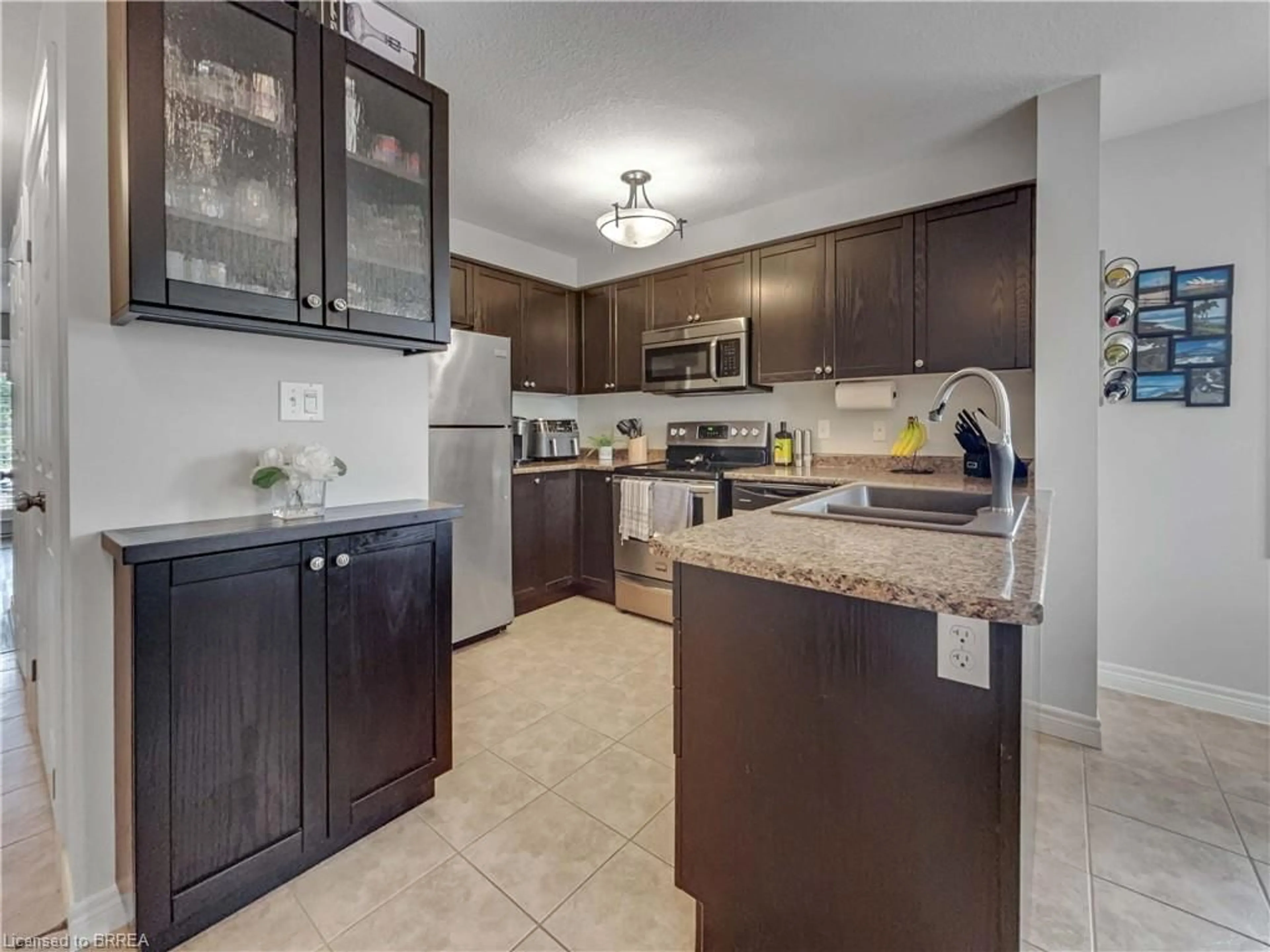 Open concept kitchen, ceramic/tile floor for 656 Woodlawn Rd #B, Guelph Ontario N1E 0K4