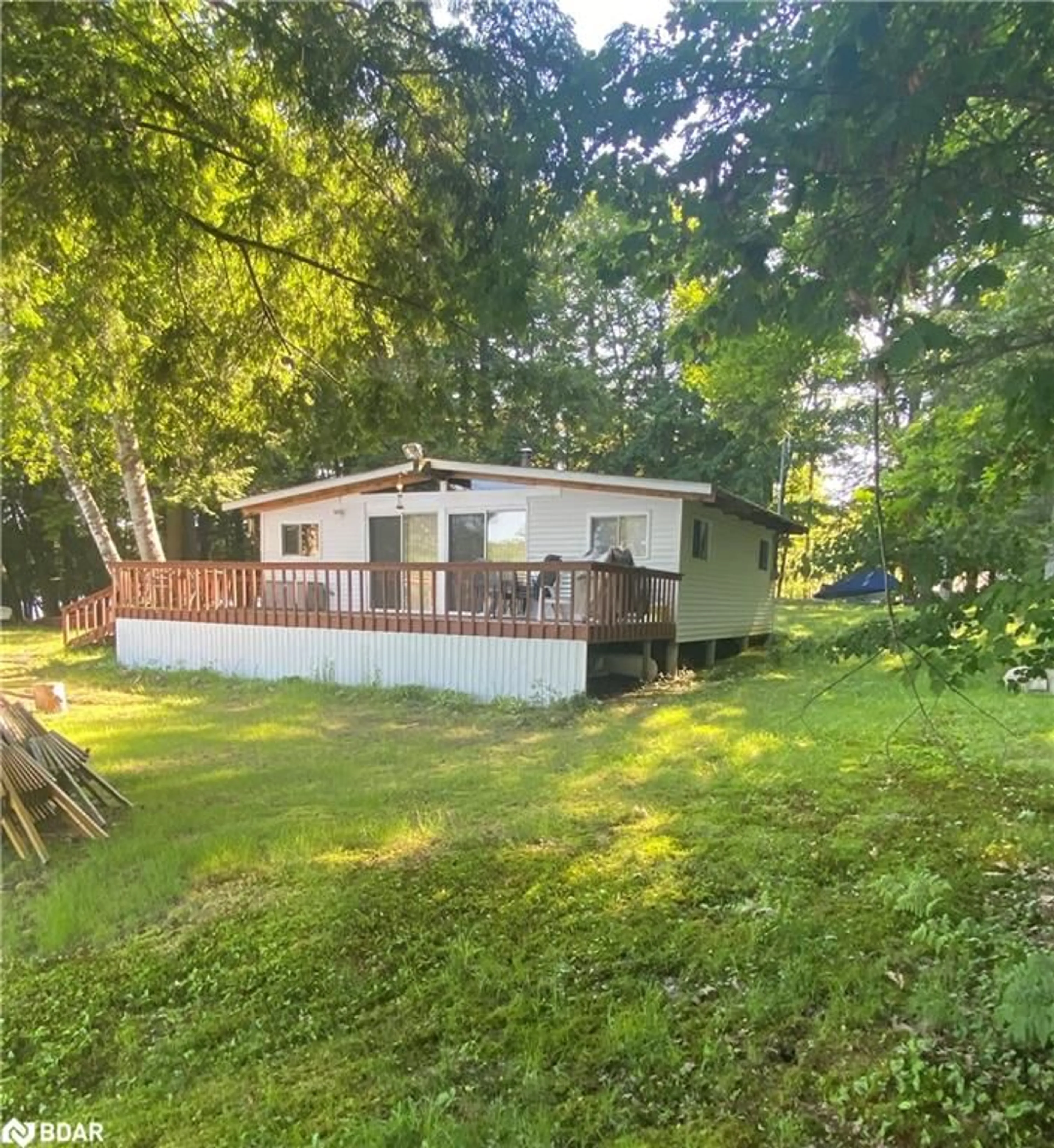 A pic from outside/outdoor area/front of a property/back of a property/a pic from drone, unknown for 4127 South Portage Rd Rd, Huntsville Ontario P1H 2J3